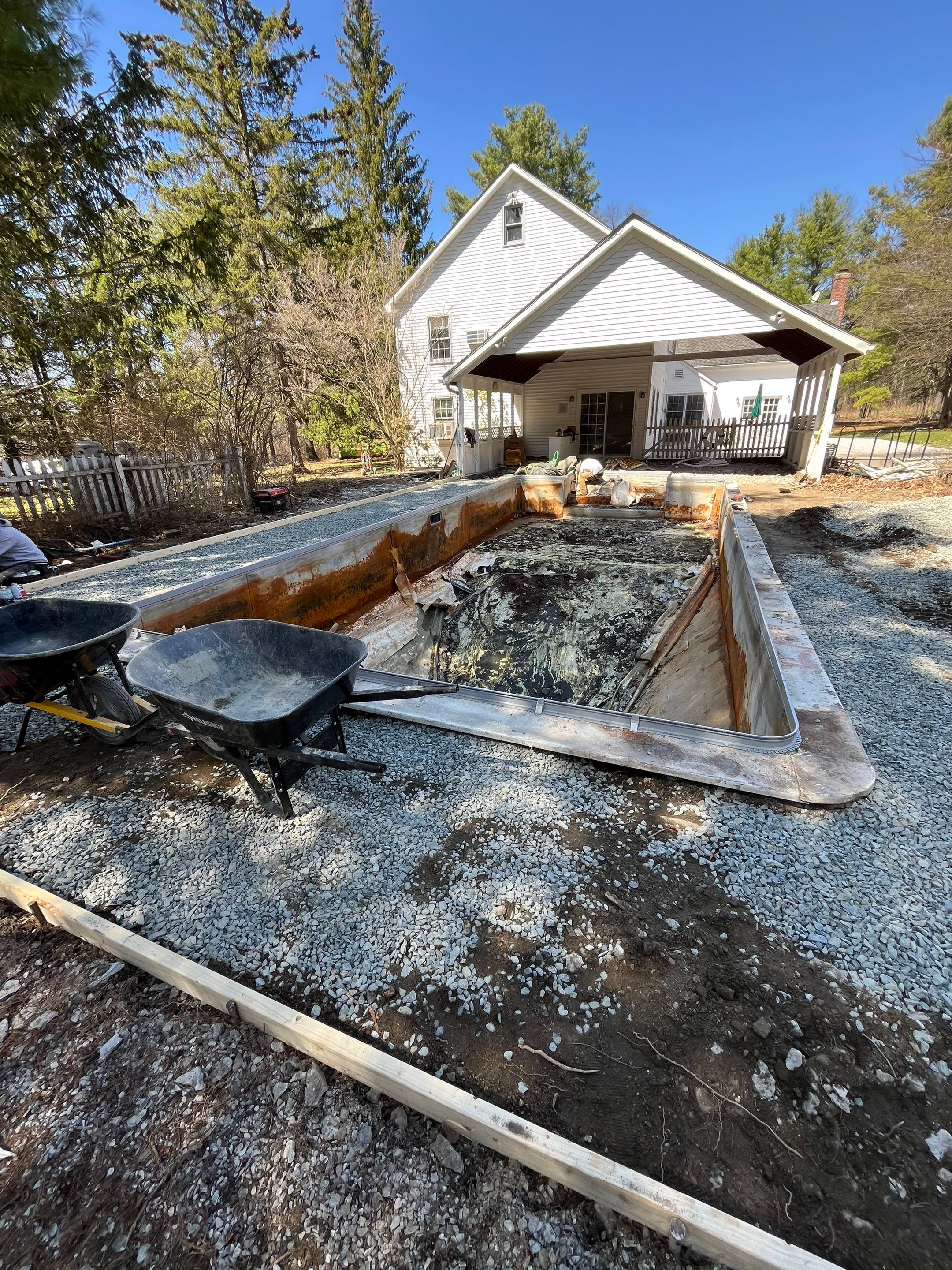 In-Ground Swimming Pool Renovation and Concrete Decking in Old Chatham by Cypress Pools and Spas