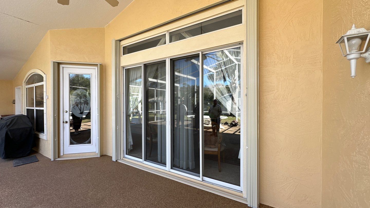 Accordion Shutters in White  by Smart Guard Shutters