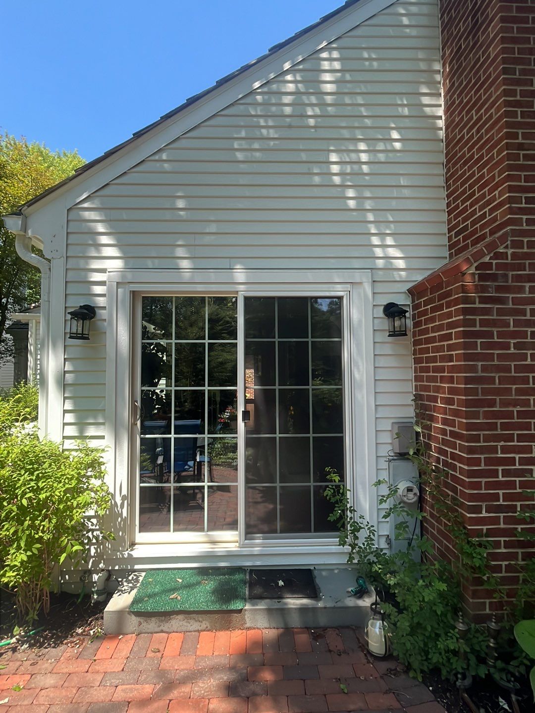 Housewashing  using Algaecide, soft wash soap by Northern Power Washing LLC.