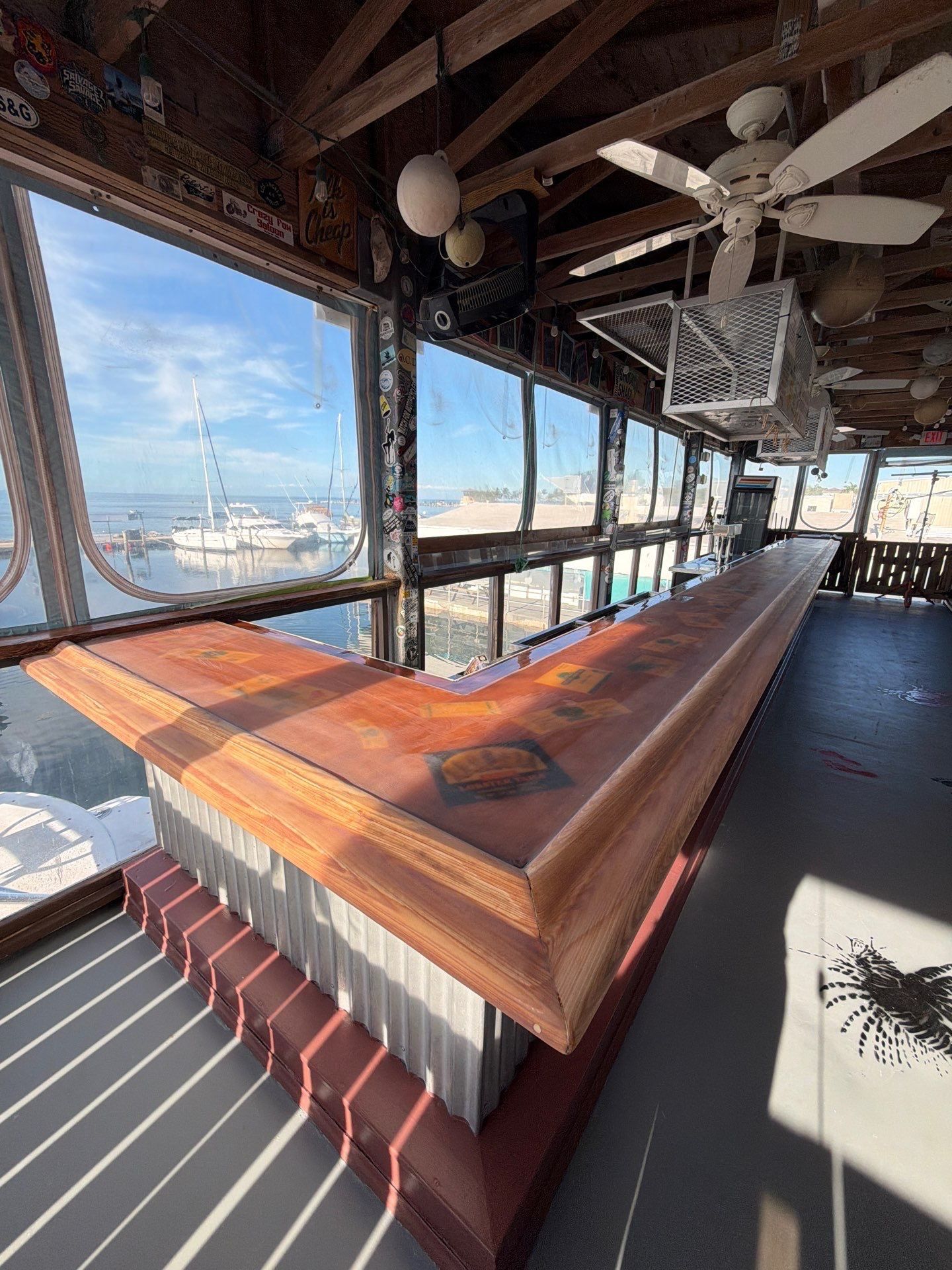 LOCAL FAMOUS FL KEYS BAR REFINISH by Tropical Epoxy Coatings & Creations LLC 