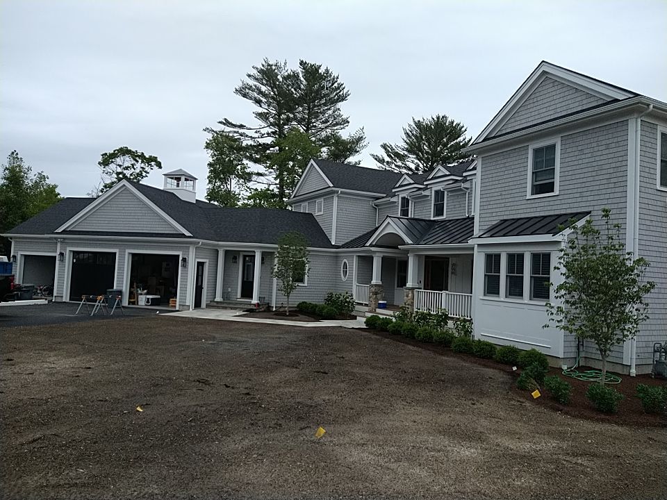K-Style Gutter Installation with Round Downspouts in Marshfield, MA by Gutter Pro Enterprises