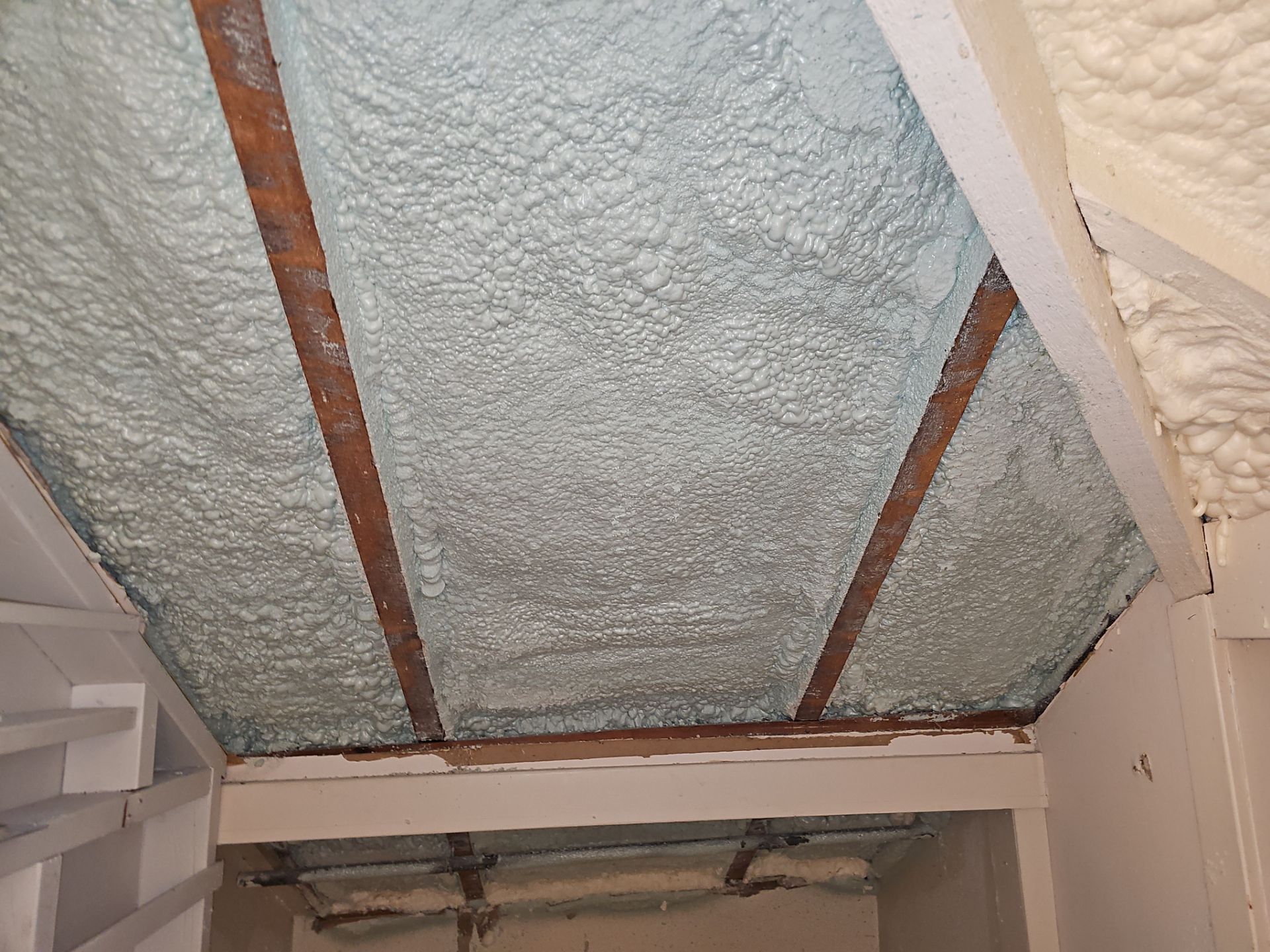 Attic Insulation using open cell spray foam by NYS Foam & Energy