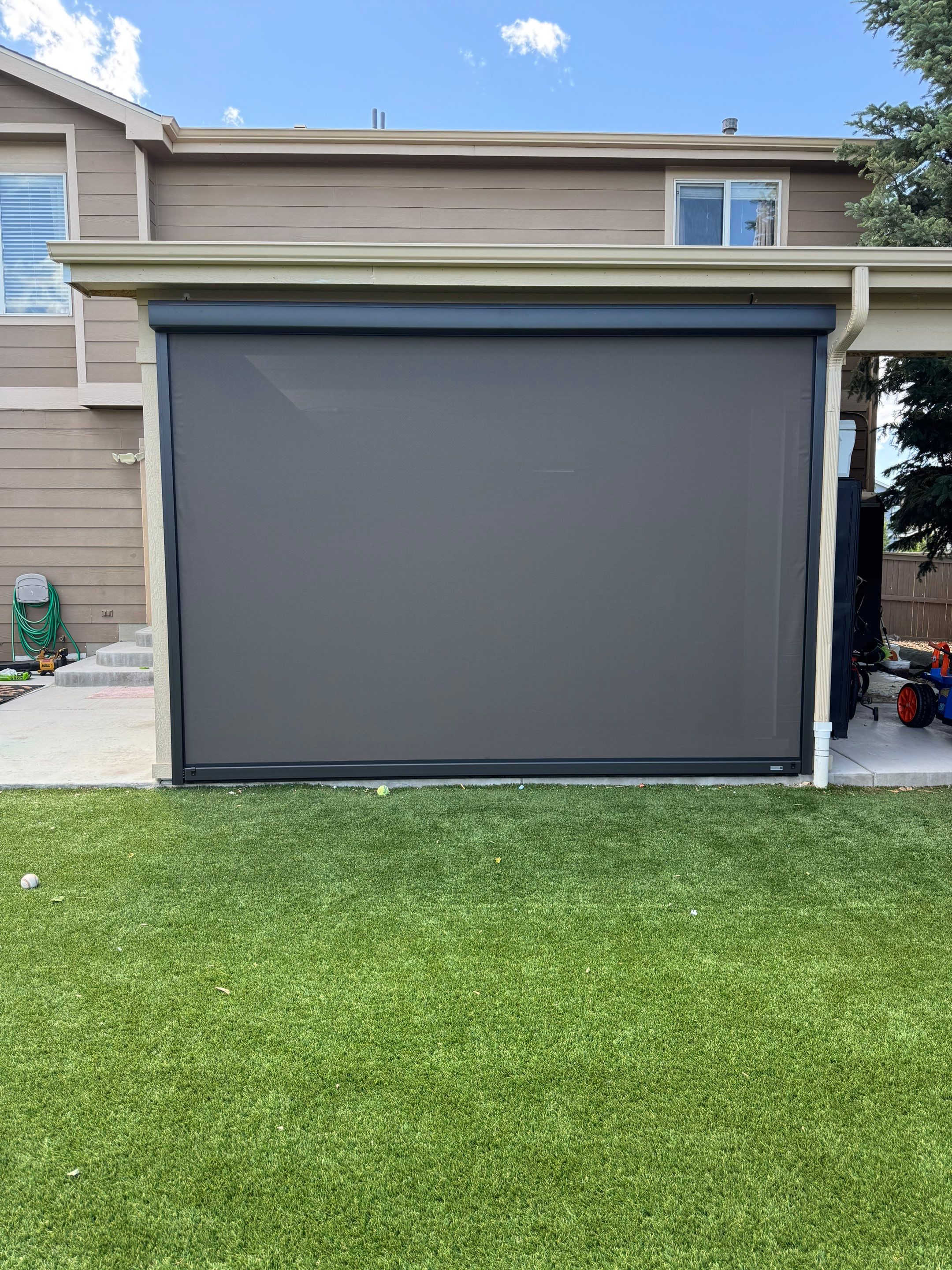 Motorized MagnaTrack Privacy Screen Installation on Castle Rock Patio by Outdoor Solutions Colorado