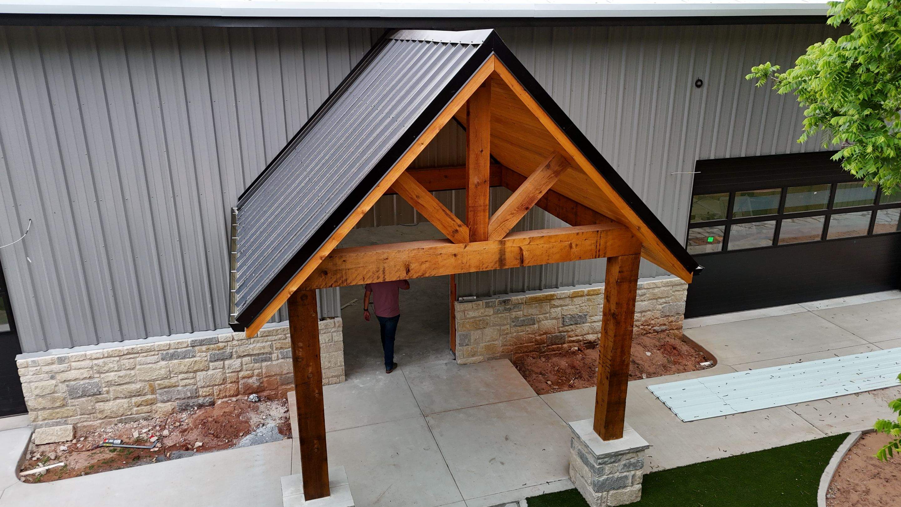 Front Porch Metal Canopy & Cedar Stain in Edmond, OK by 5Coat Roofing & Construction