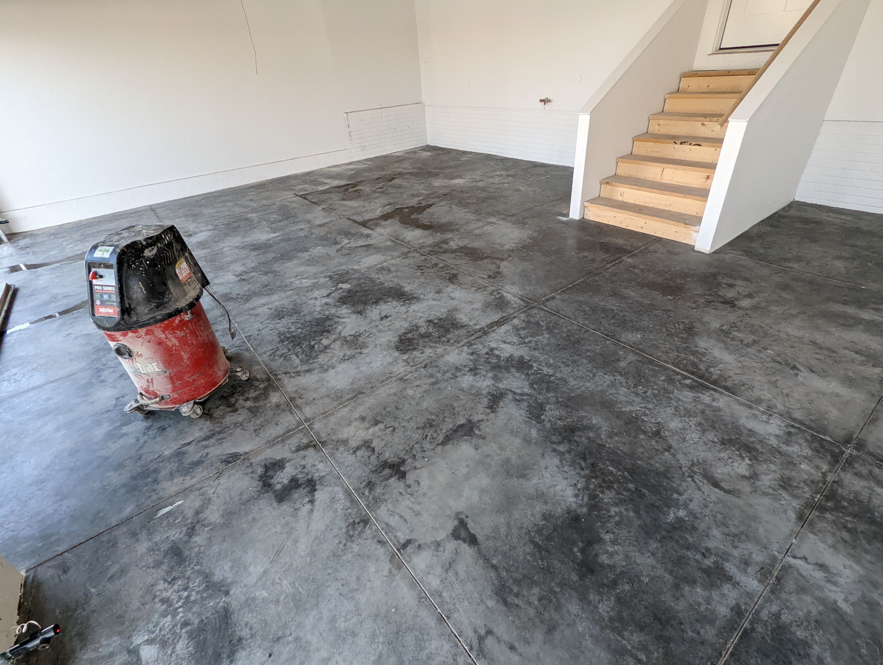Garage using Sandstone by Select Painting, Coatings & Garage Cabinets