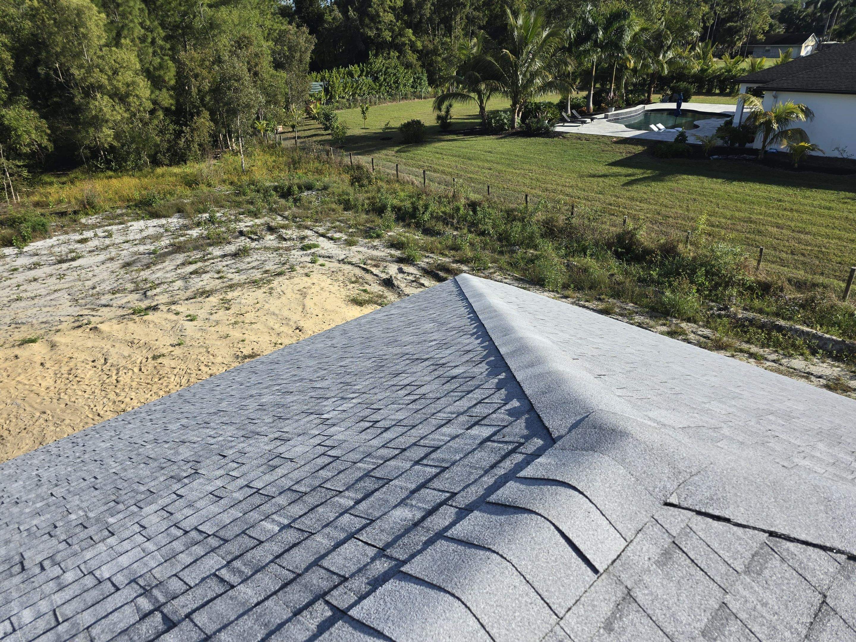 Tamko Heritage Glacier White by Total Roofing System The Metal Roof Experts