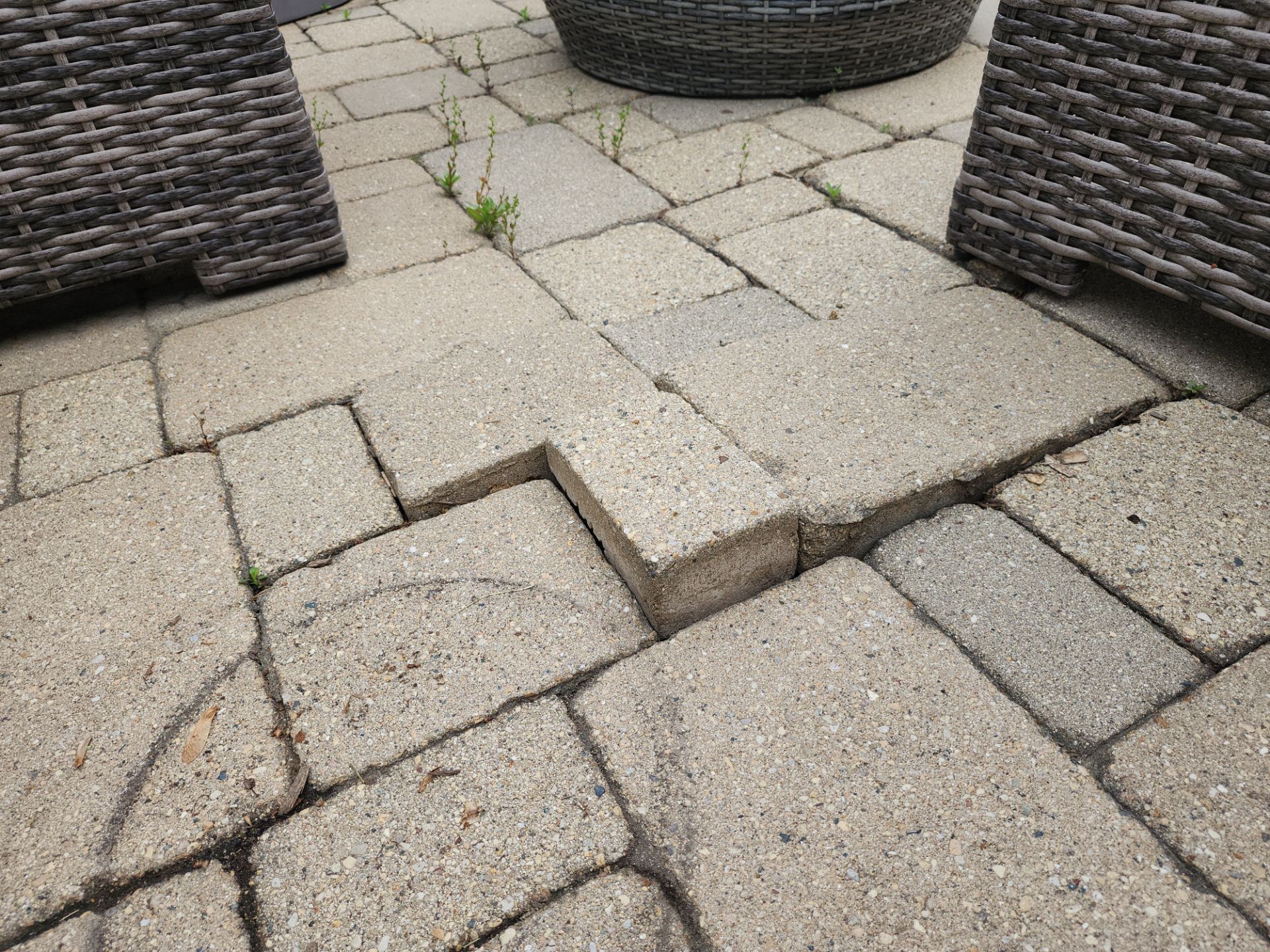 Brick paver repair, cleaning sanding and sealing by Northern Power Washing LLC.