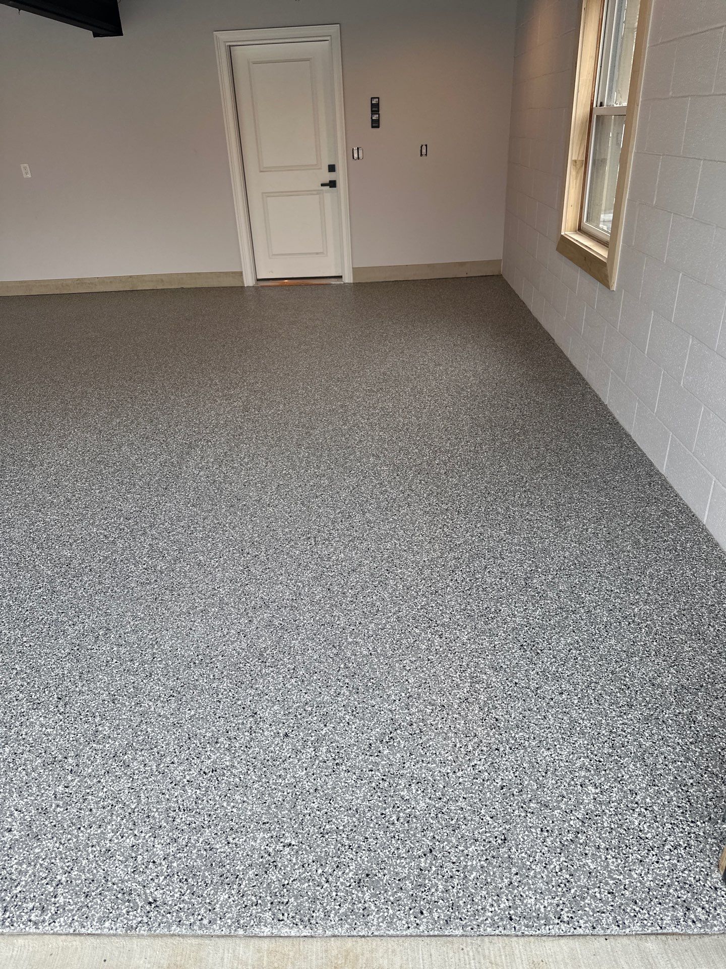 Garage Floor Coating using Wombat by My Garage Floor Guys