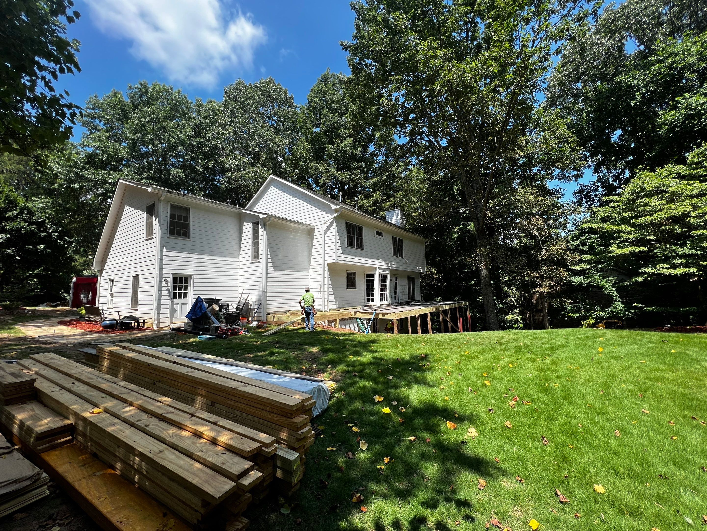 Elevated Composite Deck and Screened Porch Construction in Duluth by Swift Home Renovations 