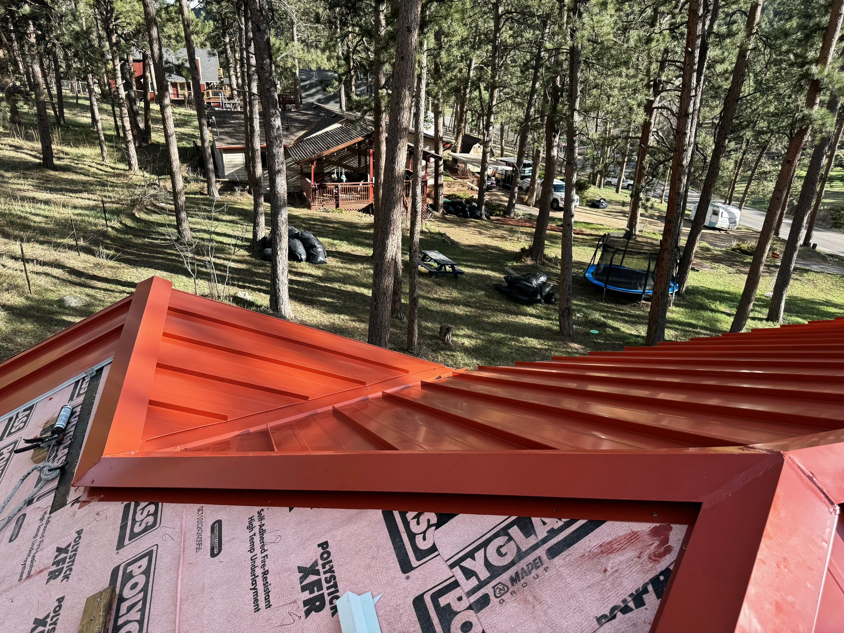 Residential Roofing Installation using Standing Seam Metal by Blue Peaks Roofing LLC 
