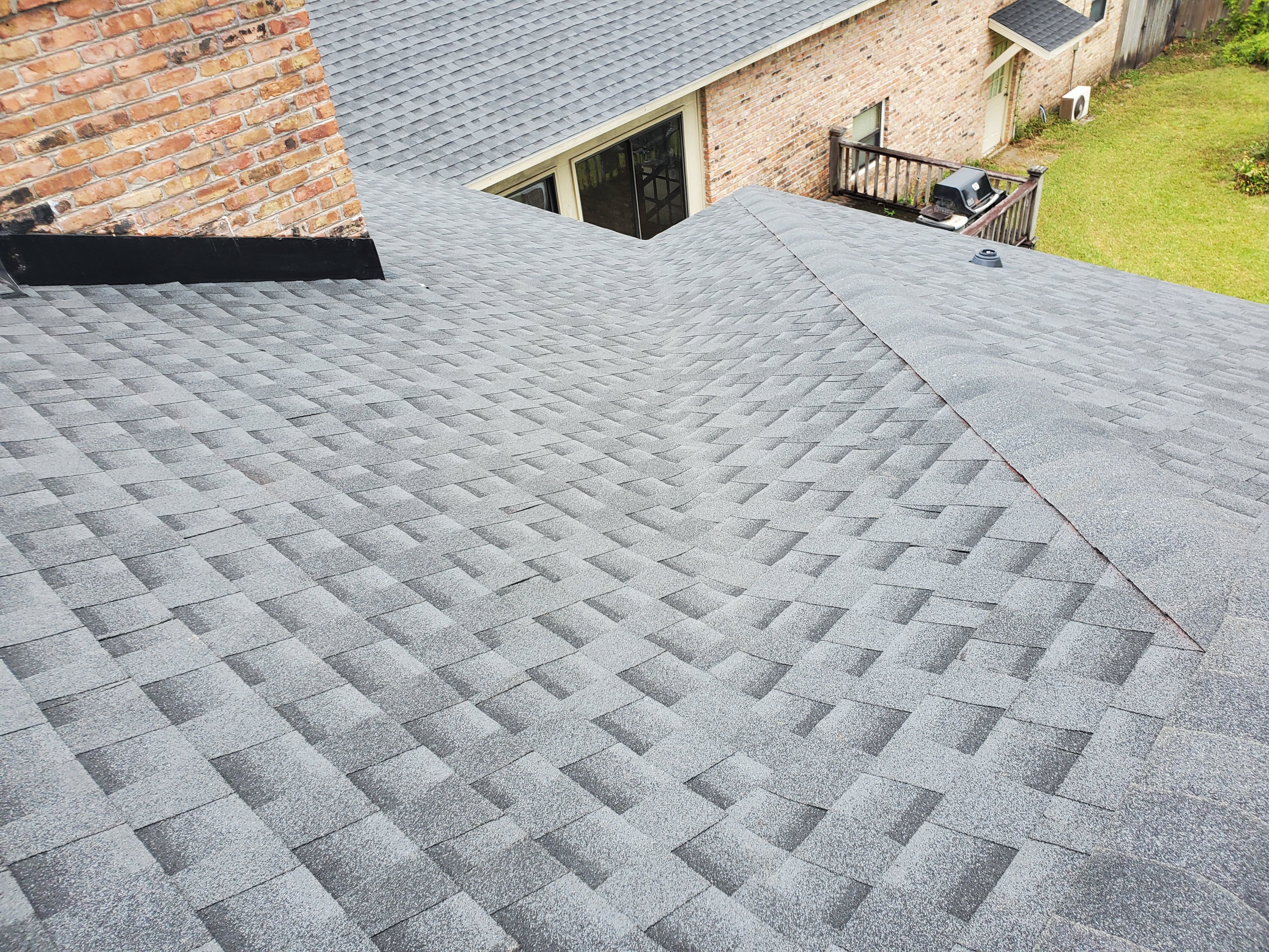 Residential Roofing Installation using Roof Replacement by American Roofing & Construction LLC