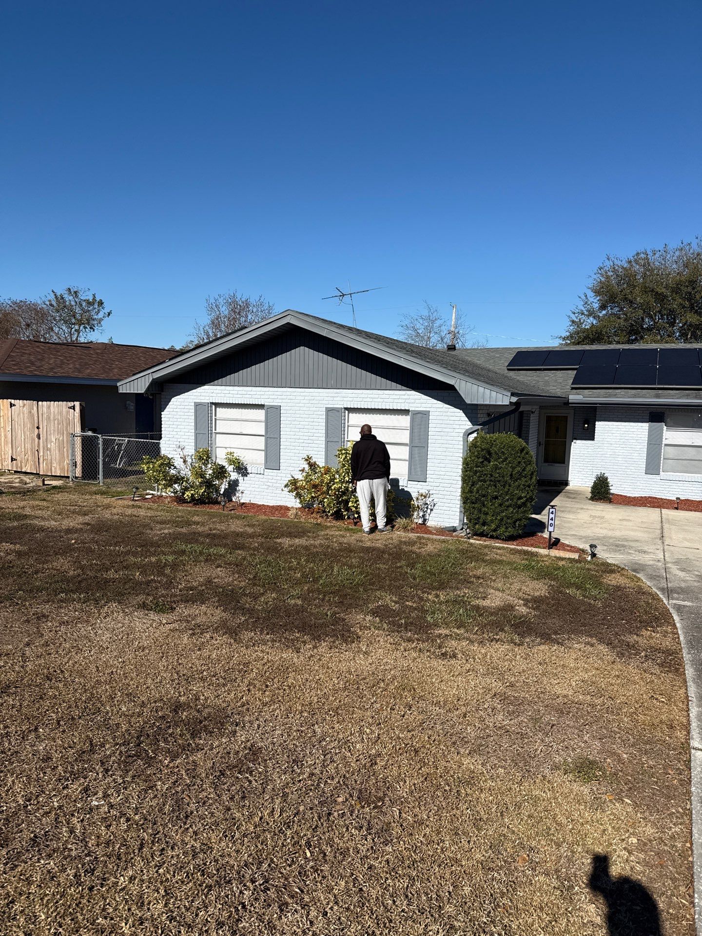 Downspout Installation using Downspout Extension and new Gutters in Winter Haven FL by Gutter Professors