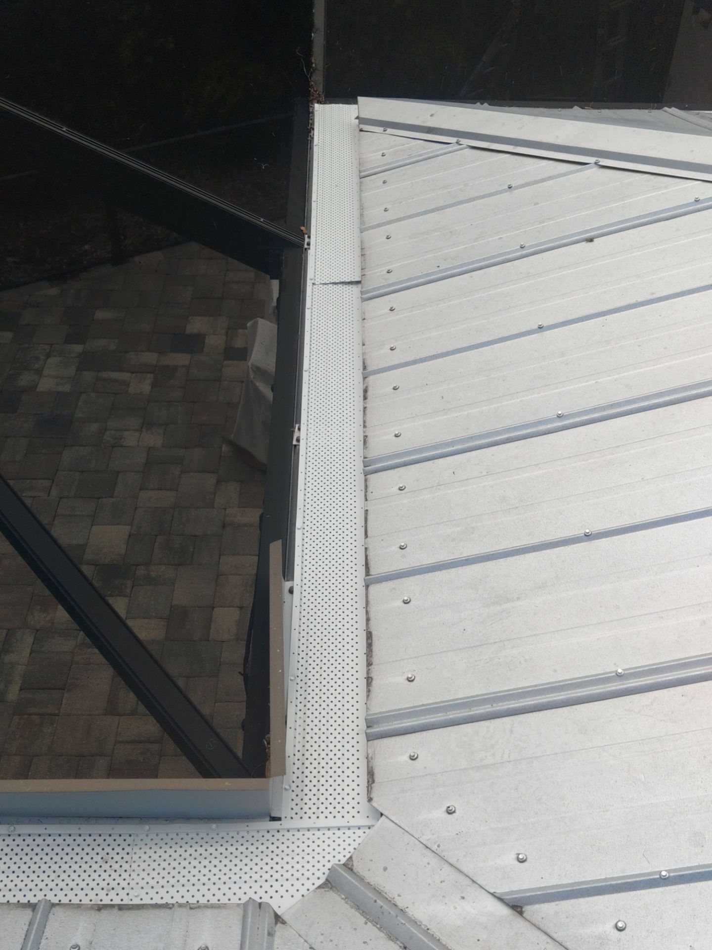 Gutter guards installation combined with gutter cleaning in Sarasota, FL by Gutter Professors