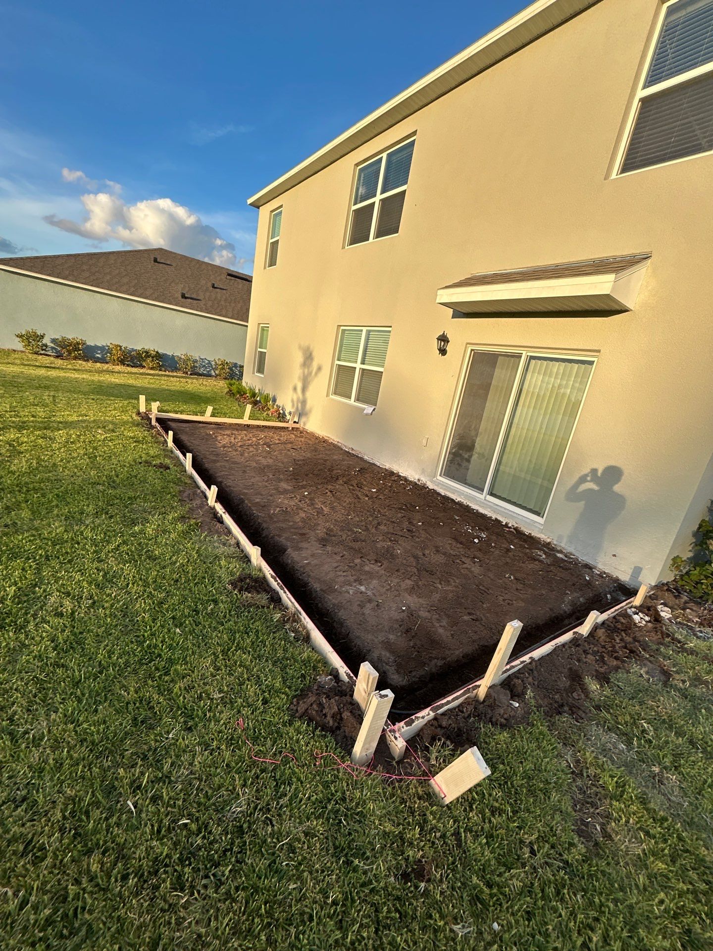 New concrete pad by Courtesy screening