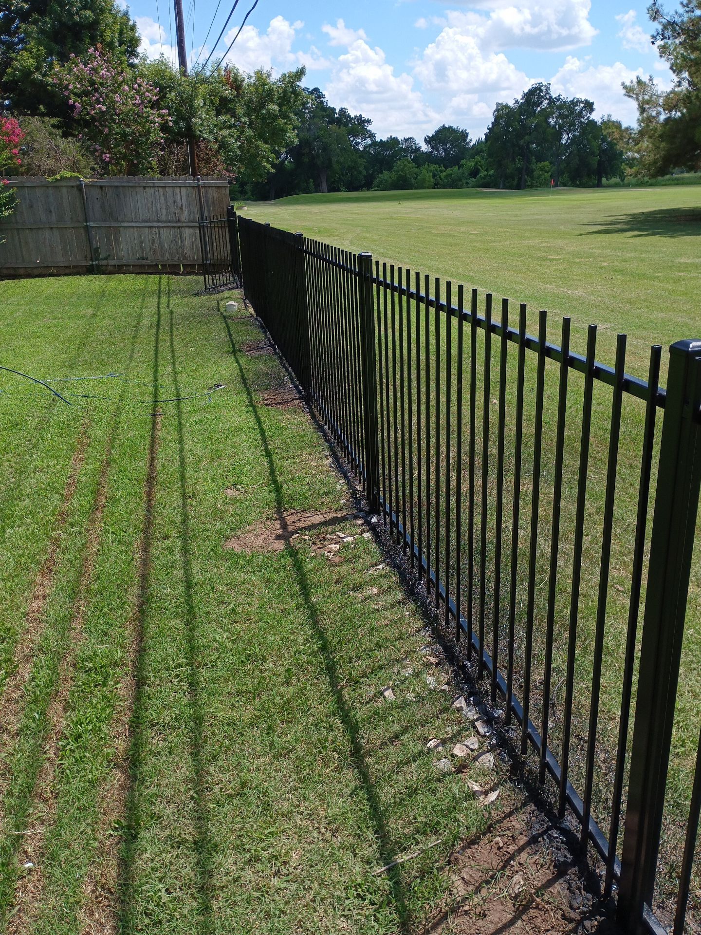 Custom Metal Fence Build by Clays Services Inc