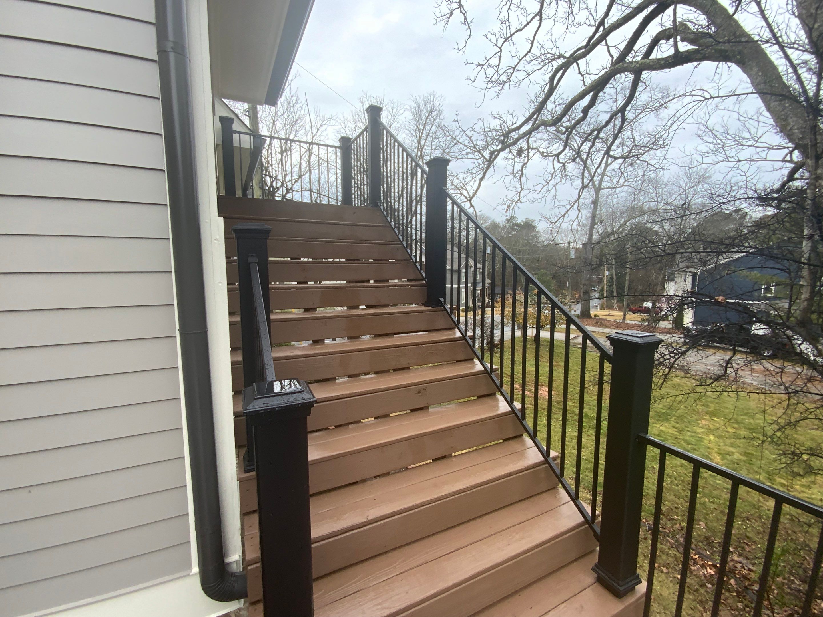 Modern Black Metal Railing and Composite Deck Upgrade in Norcross by Swift Home Renovations