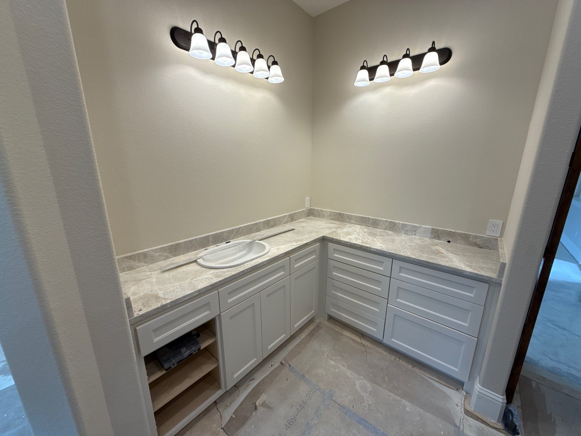 Frameless Rain Glass shower and Framed Mirror Project  by Richardson Glass & Mirror