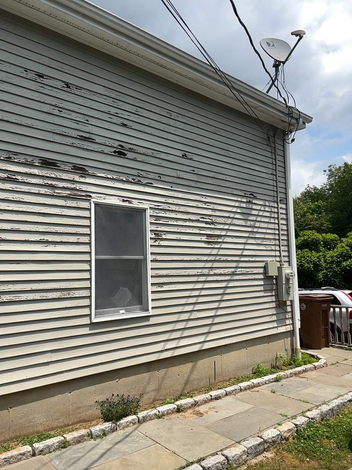 Siding Installation using Mainstreet Colonial & White gutters by A Plus Exterior