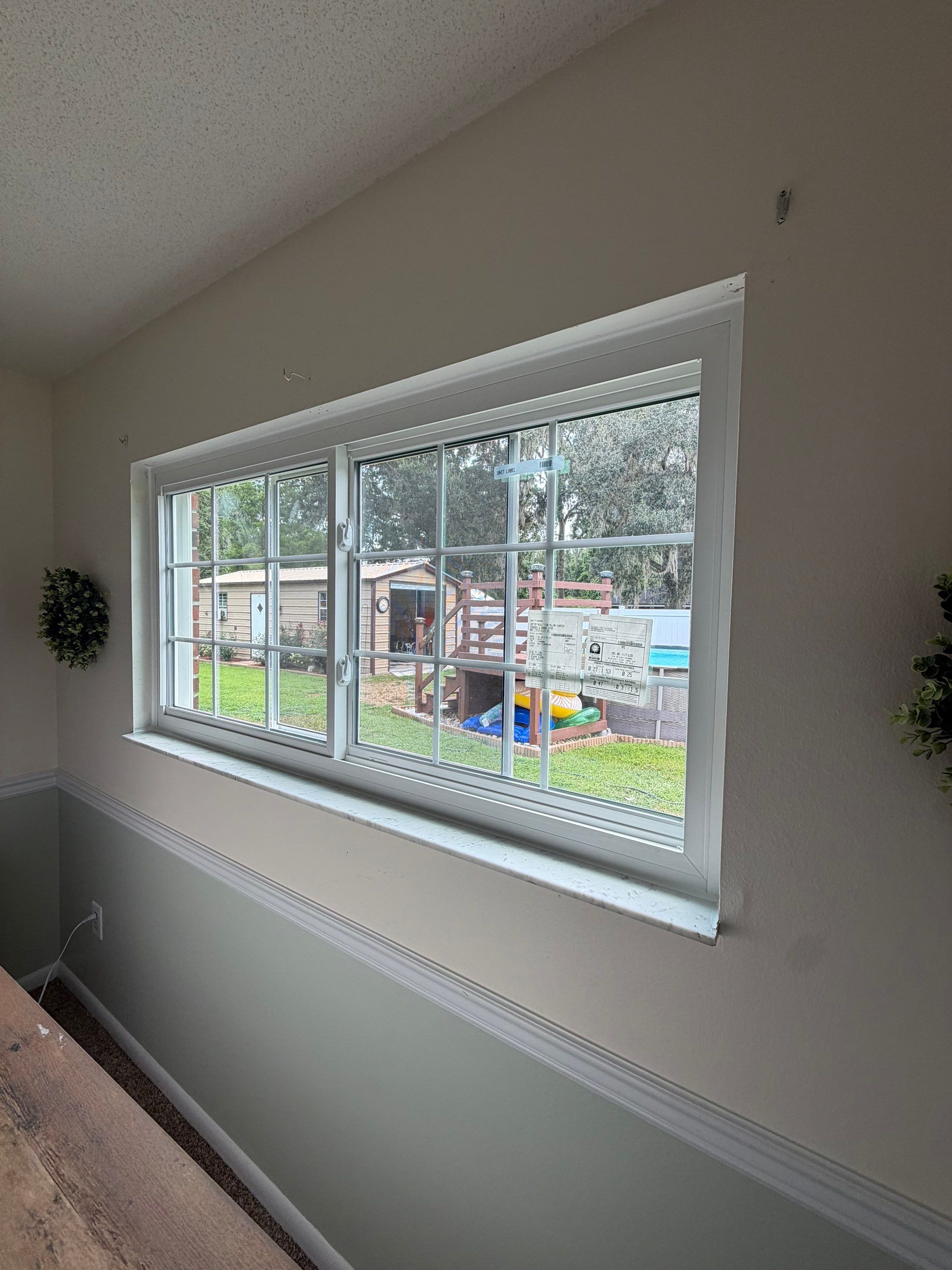 Energy-Efficient White Vinyl Window Replacement in Lake City, Florida by Windows & Doors Store