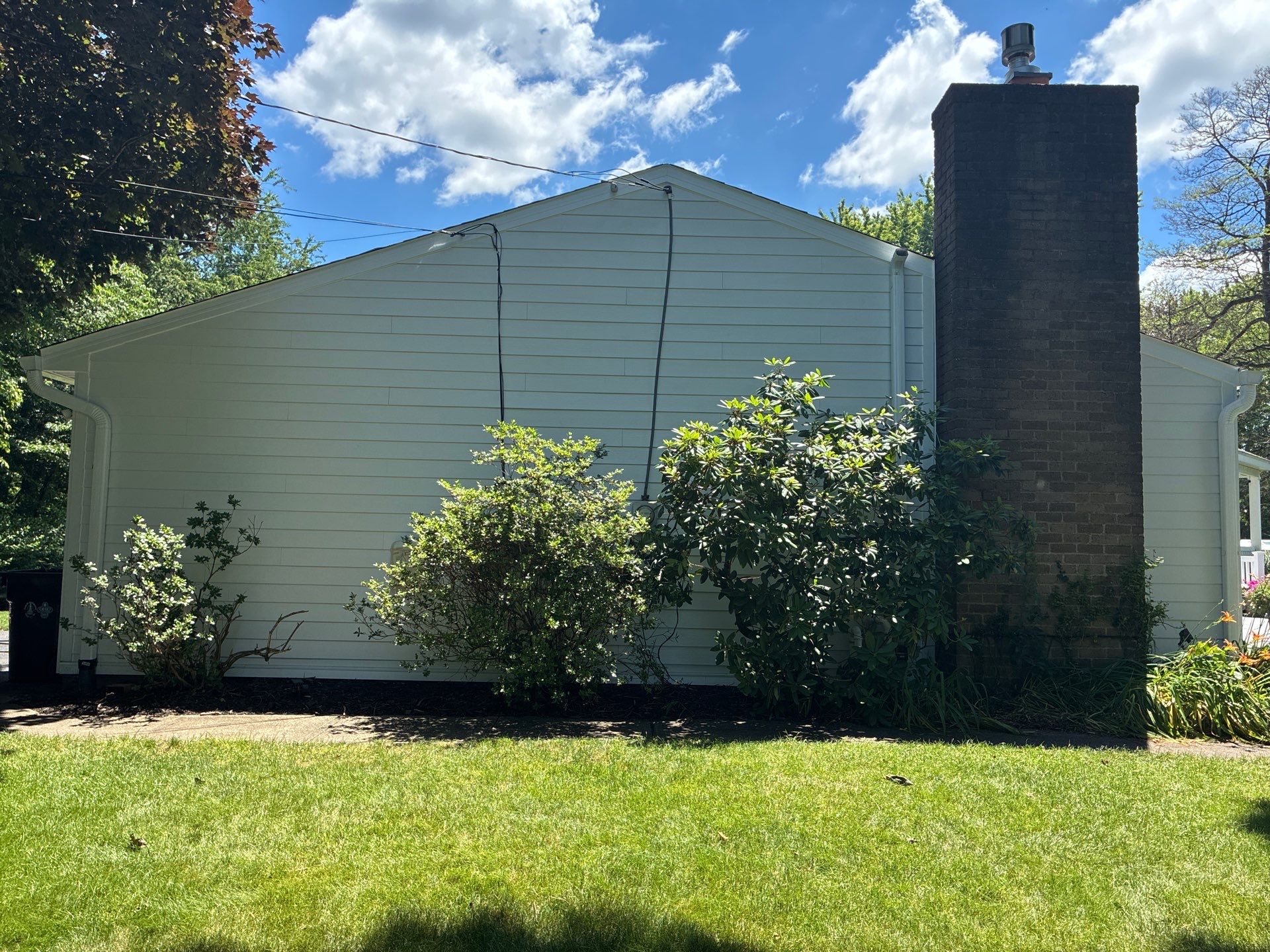 Vinyl Siding to James Hardie Arctic White with Midnight Black Trim by Ideal Siding Pittsburgh
