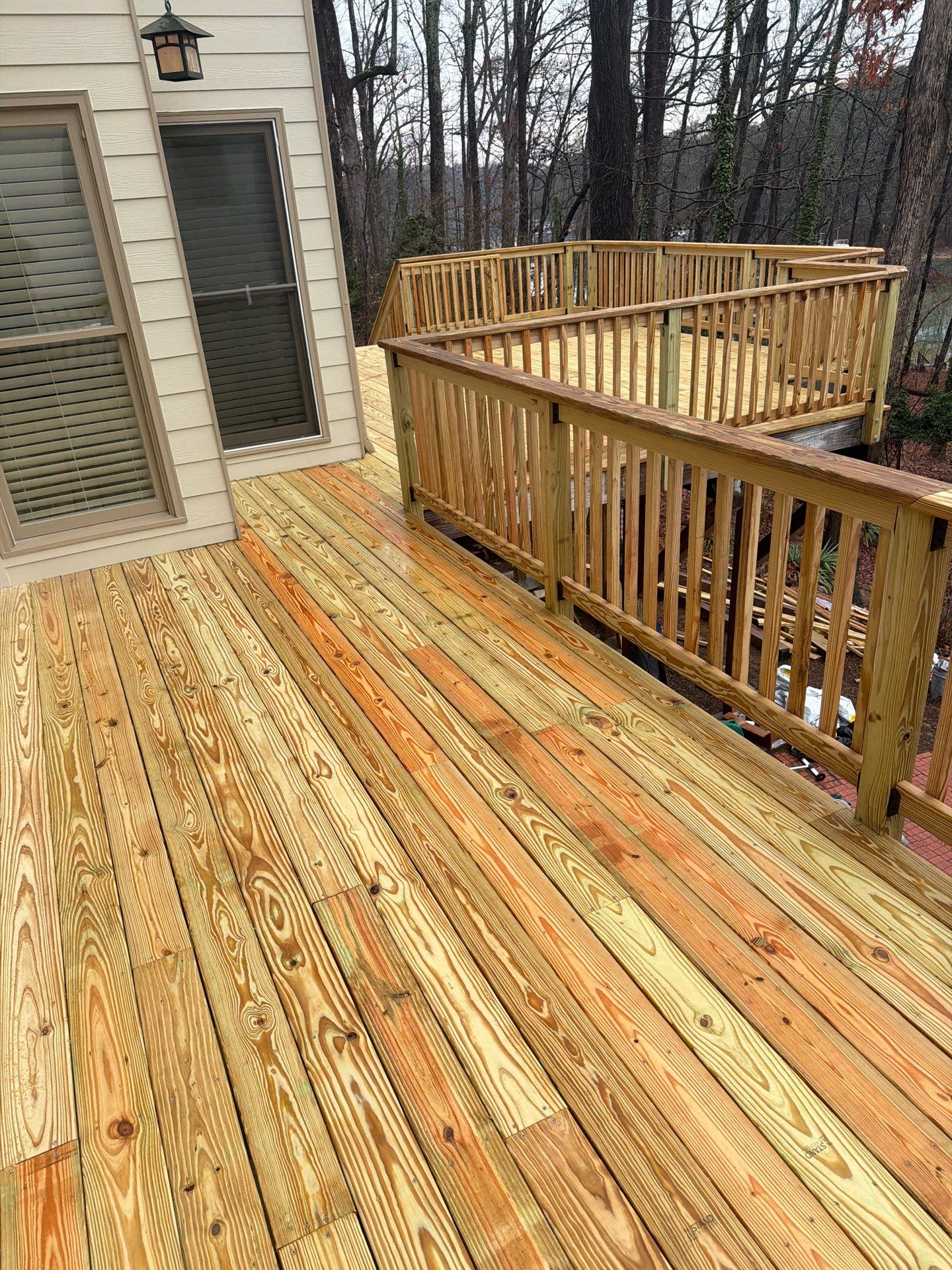 Buford, GA Deck Resurface and Extension using Pressure Treated Pine  by Nelson Exteriors 