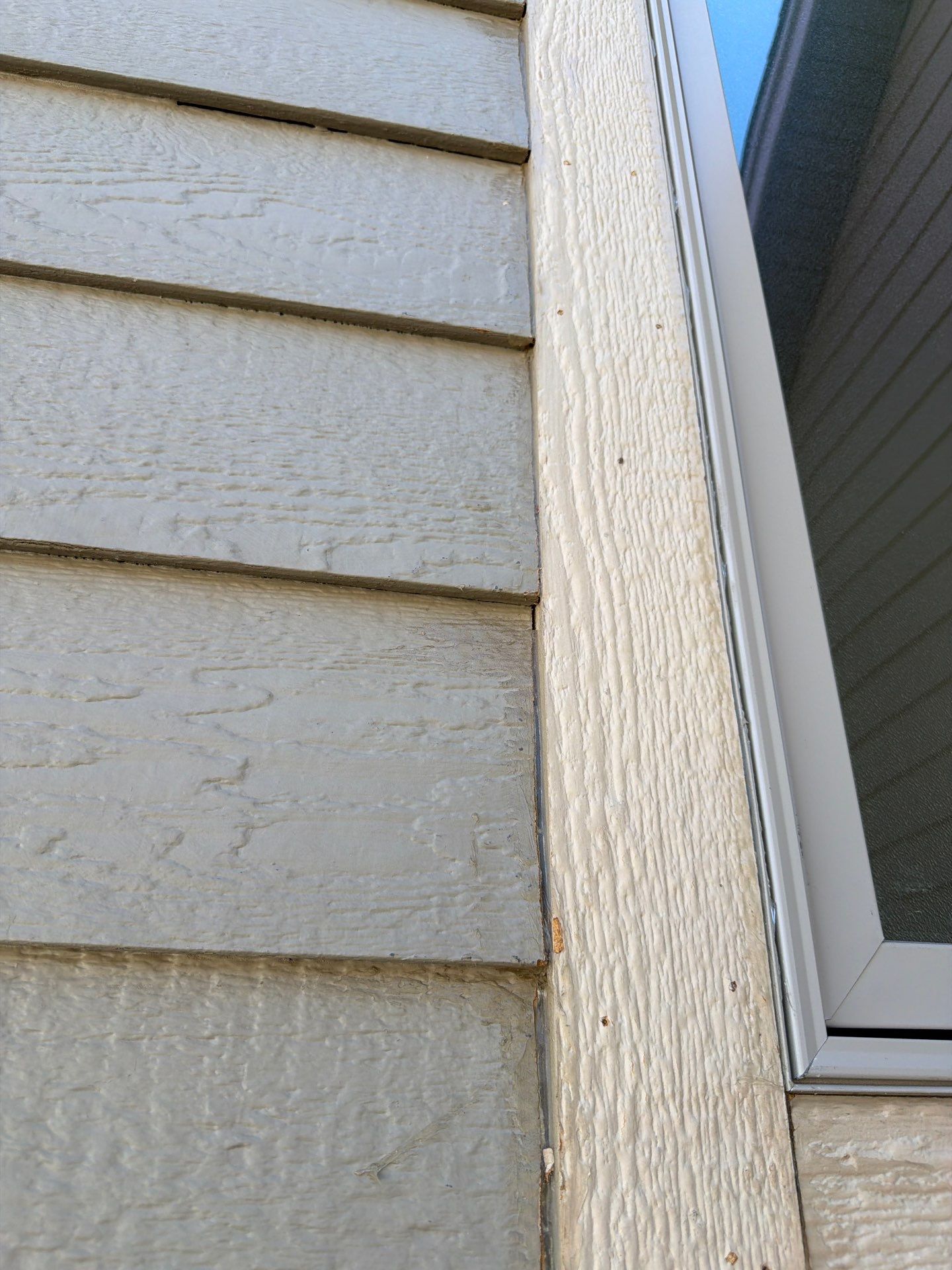 Residential Exterior Painting and Siding Refresh in Sioux Falls by Select Painting, Coatings & Garage Cabinets