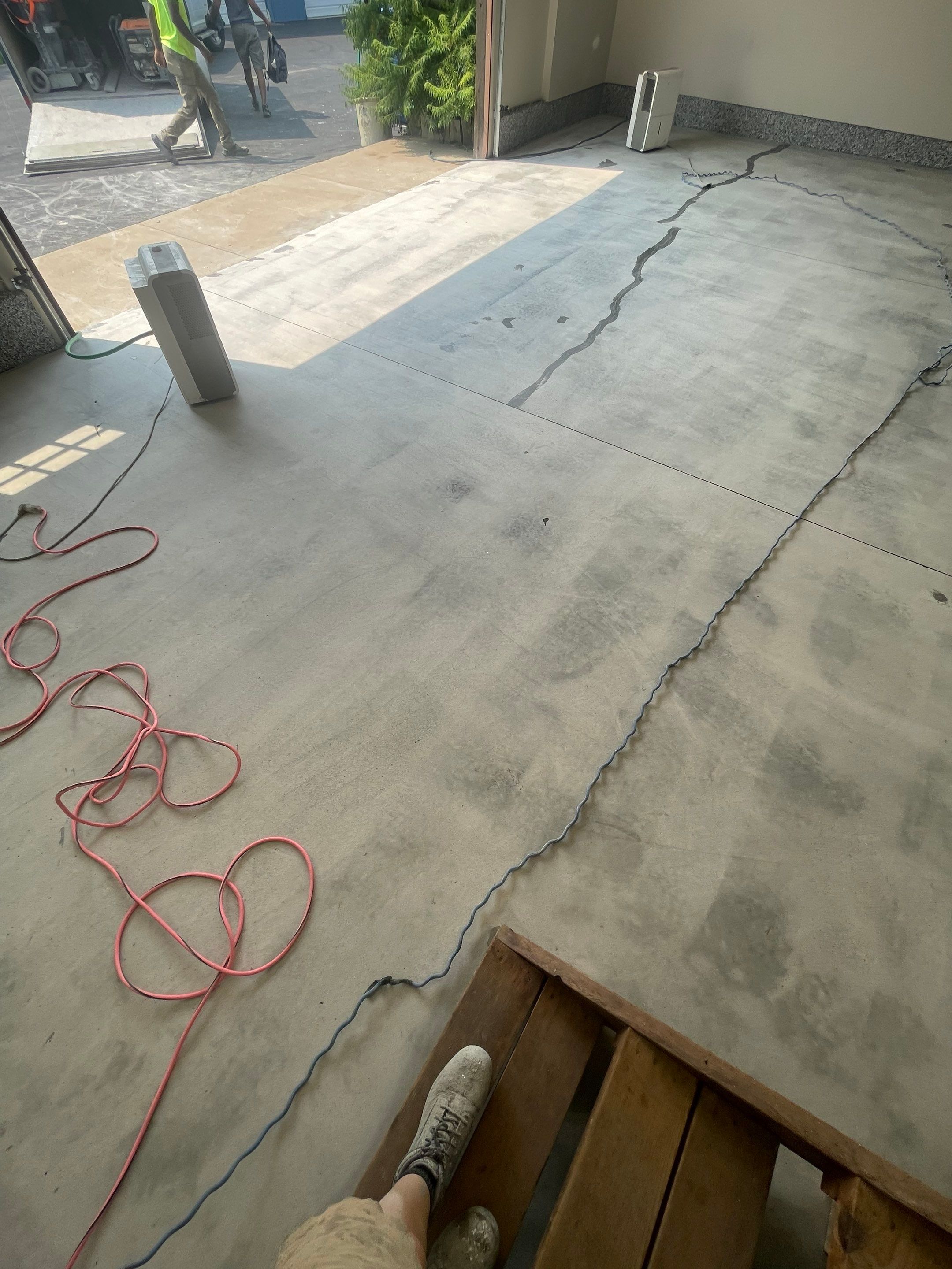 Domino Flake Floor Coating and Crack Repair in Chancellor by Select Painting, Coatings & Garage Cabinets