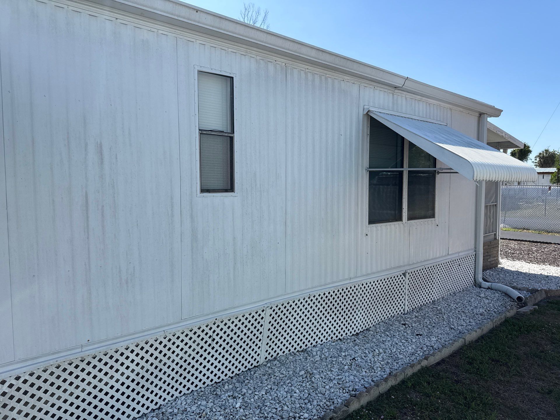 Mobile Home Soft Wash & TPO Roof Cleaning in Plaza Estates – Bradenton, FL by Sunshine AquaWash