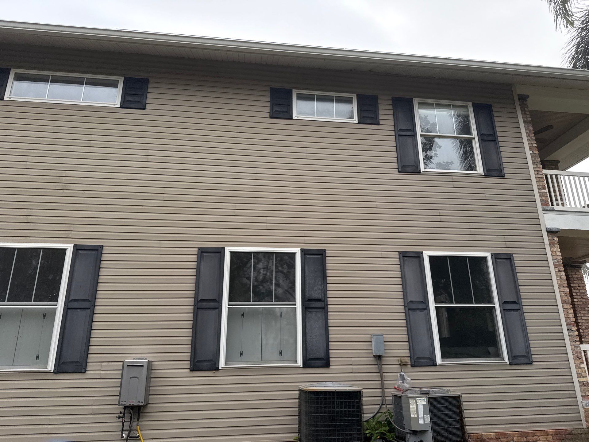 2-Story House Wash and Garage Pressure Washing in Palmetto, FL by Sunshine AquaWash