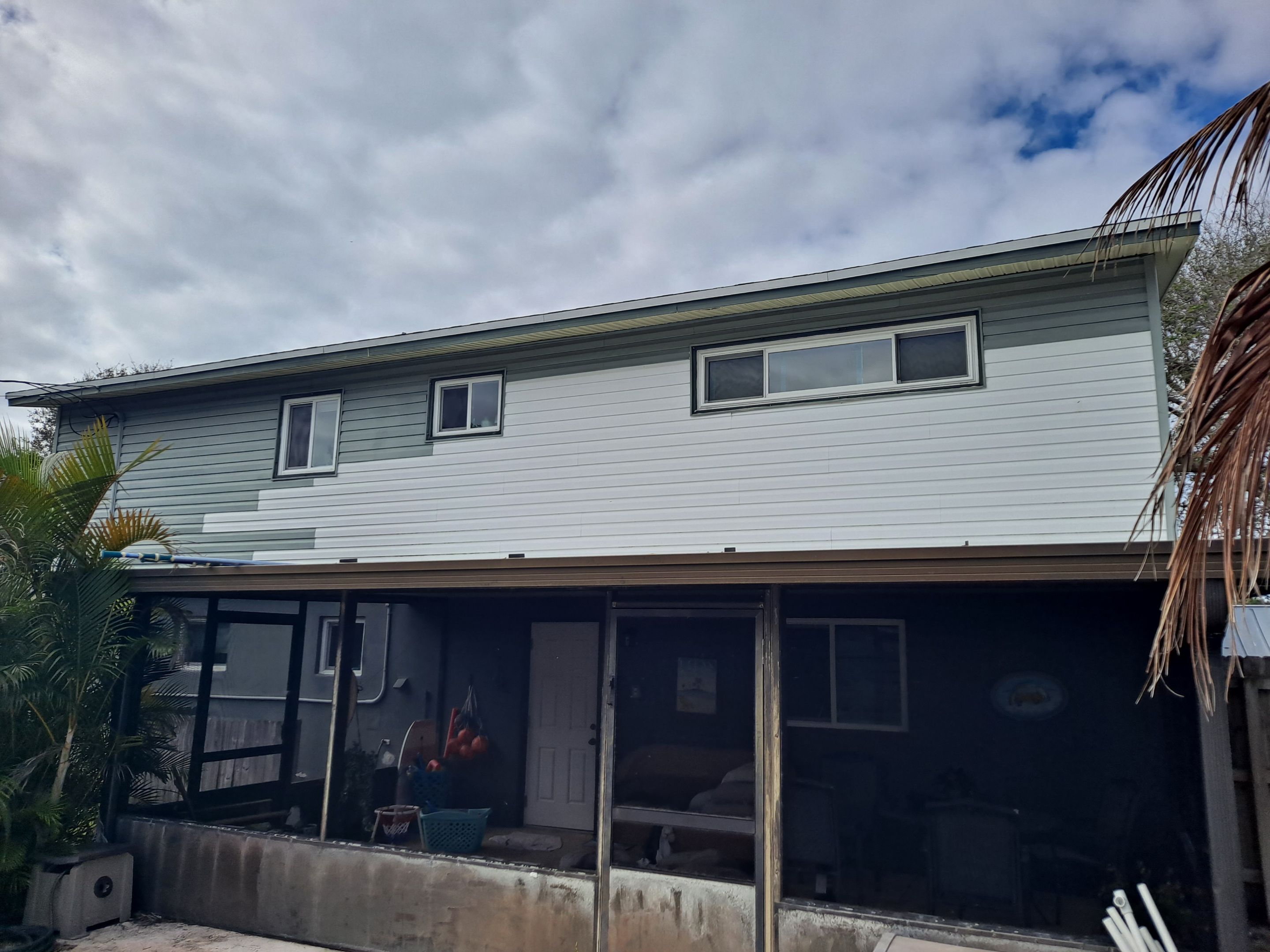 Vinyl Siding Replacement and Exterior Renovation in Satellite Beach by Florida Roofing and Renovations Inc.