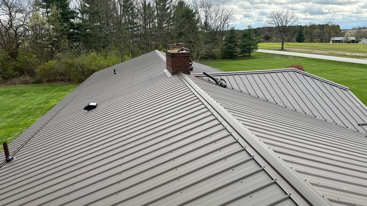Residential Roofing Installation using Performance Panel Metal - Crinkle Bronze by RoofX 
