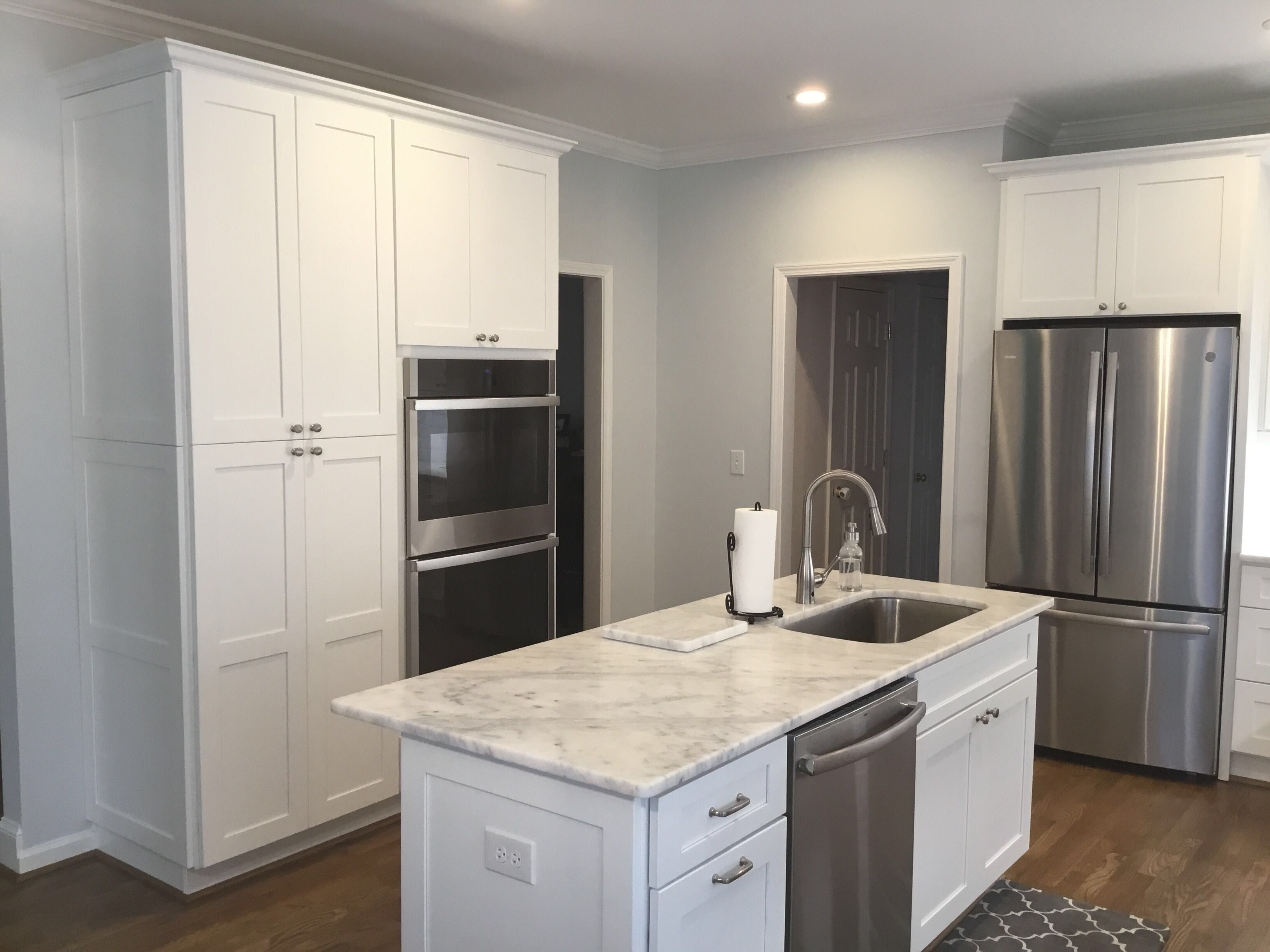 Smyrna Kitchen Renovation Featuring Custom Cabinetry and Oak Flooring by Swift Home Renovations