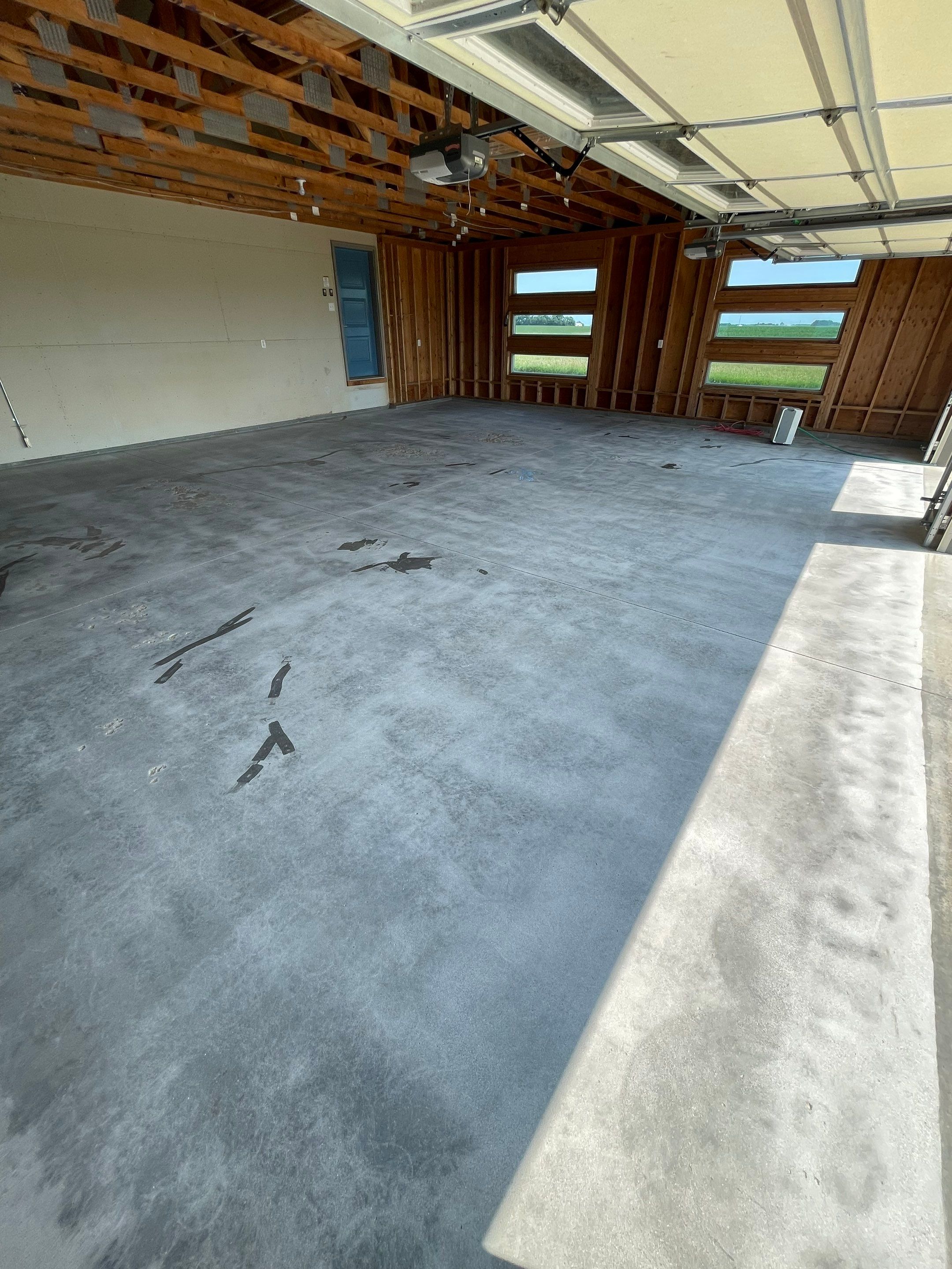 Cabin Fever Coating for Detached Garage in Dell Rapids by Select Painting, Coatings & Garage Cabinets