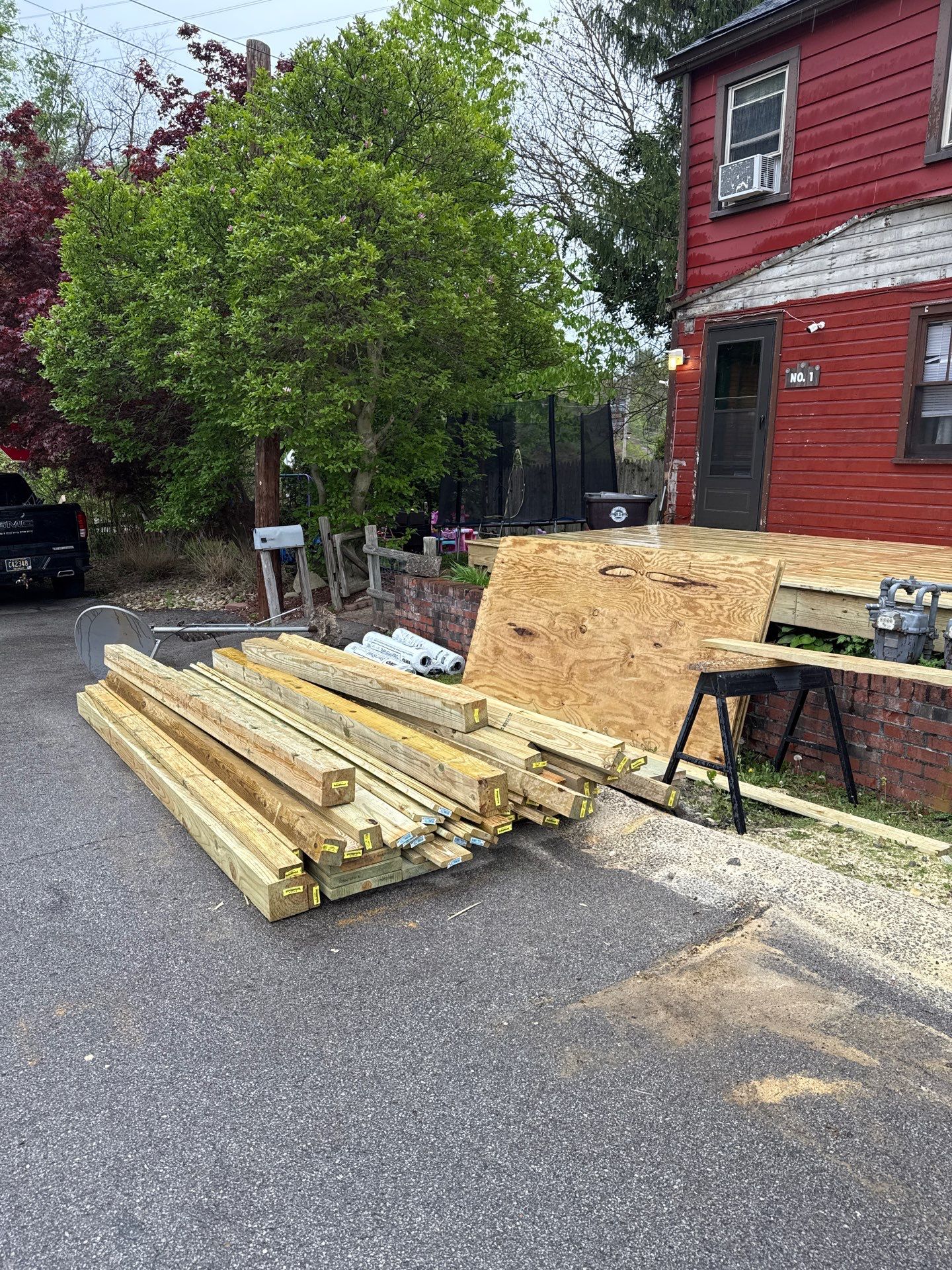 Roof sunspace deck  by Cousins Roofing Siding & Decks