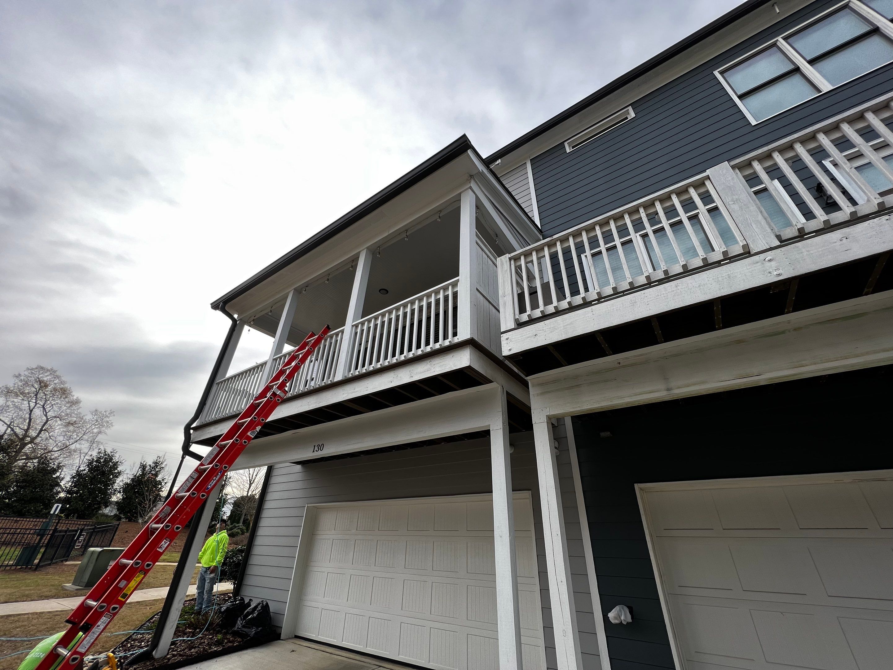 Custom Screened-in Porch Addition Above Garage in Woodstock by Swift Home Renovations