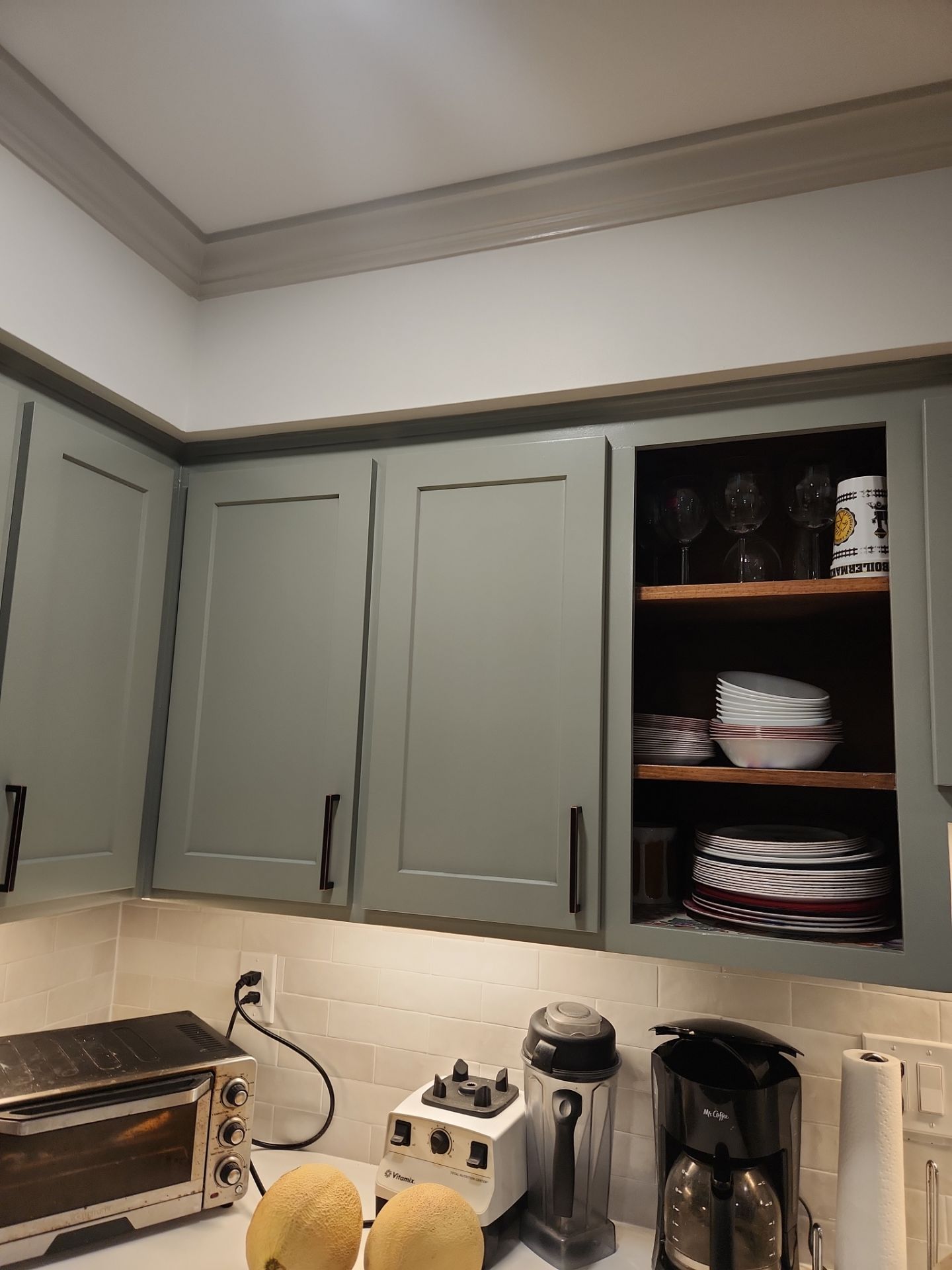 A Pathway to Personality – A Two-Tone Kitchen Transformation in Apex by Elite Remodeling and Design LLC