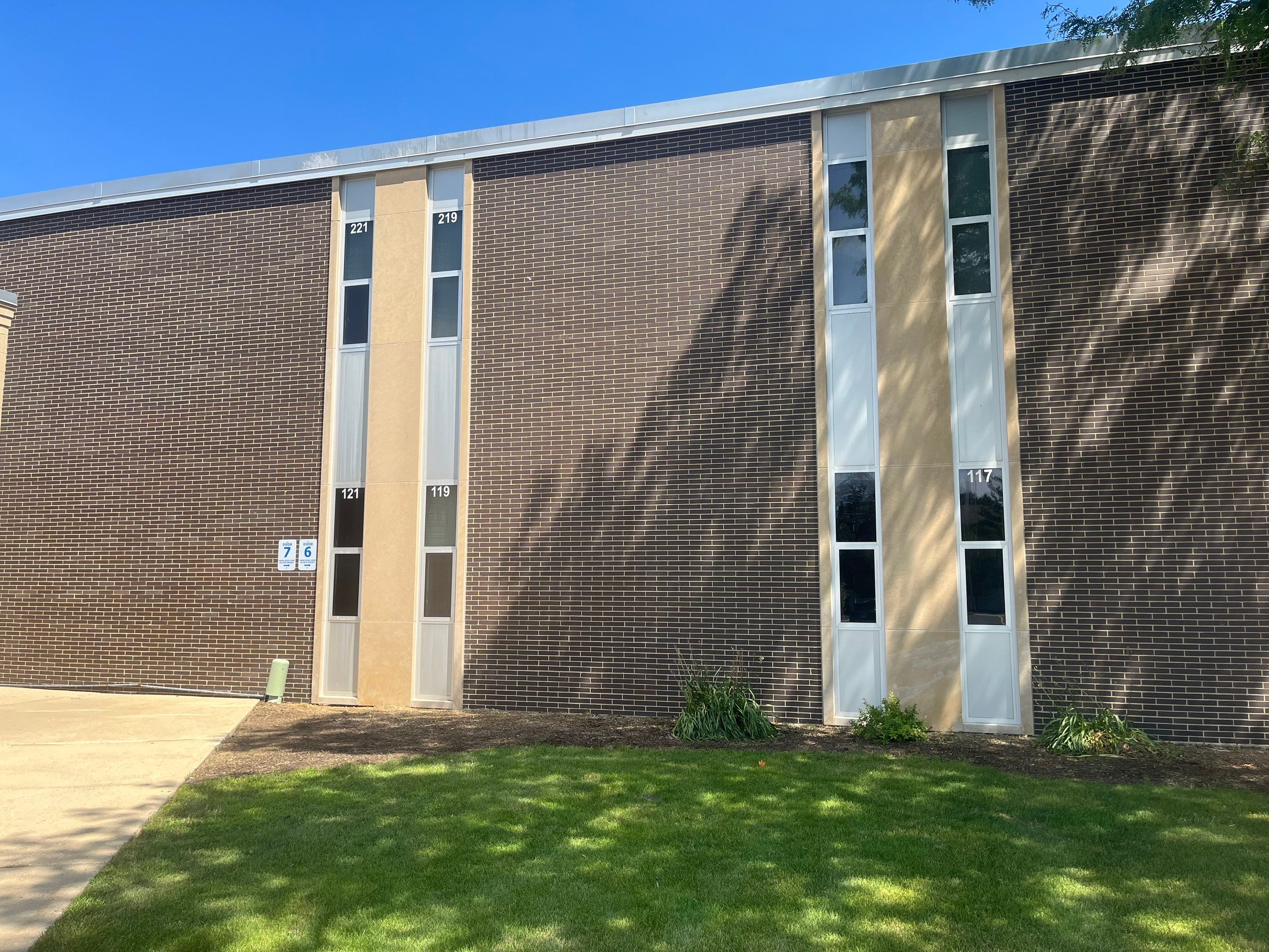commercial pressure washing using Algaecide, soft wash soap by Northern Power Washing LLC.