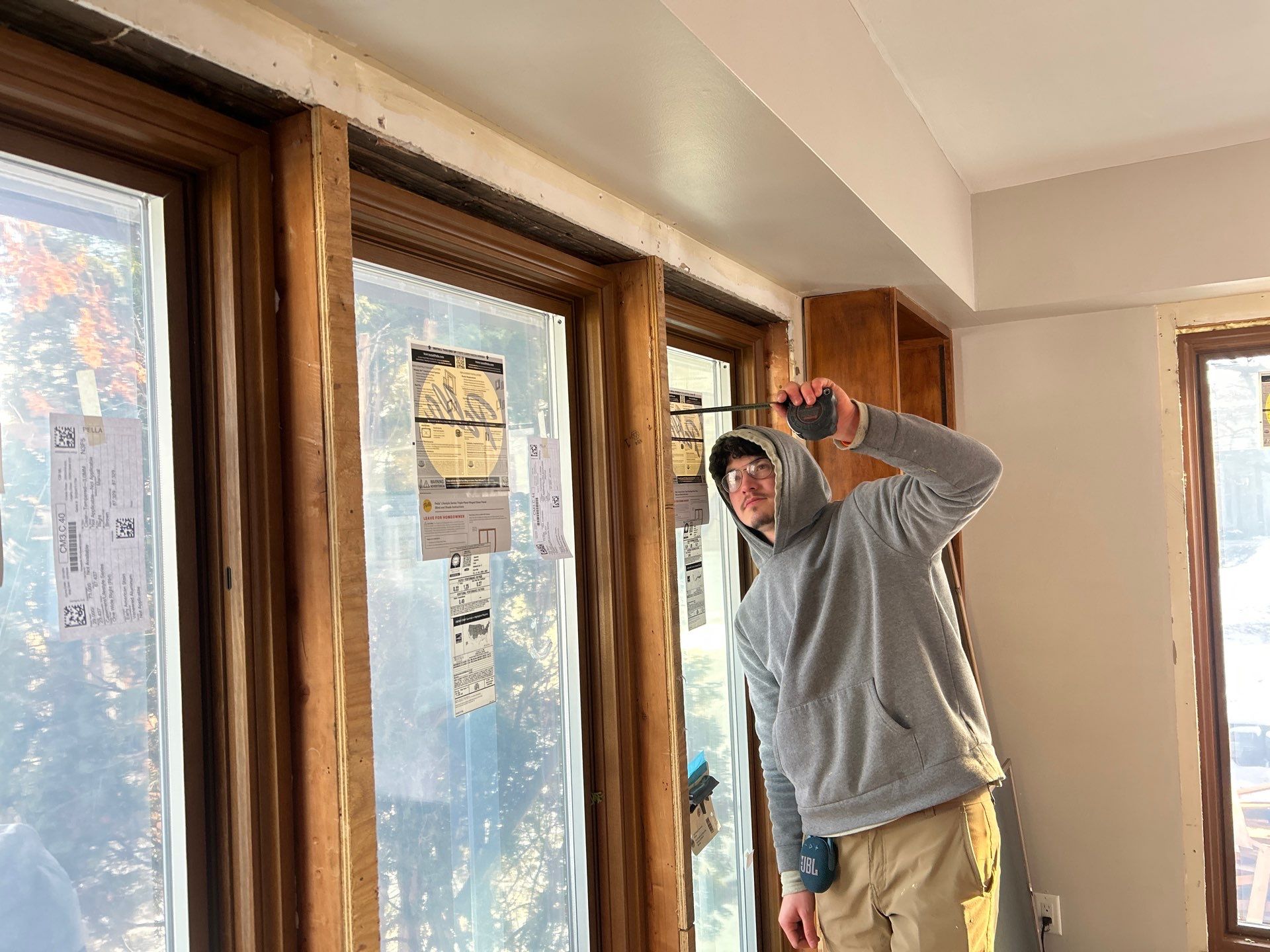 Black-Frame Pella Lifestyle Upgrade on a Partial Brick Home by United Windows and Siding LLC