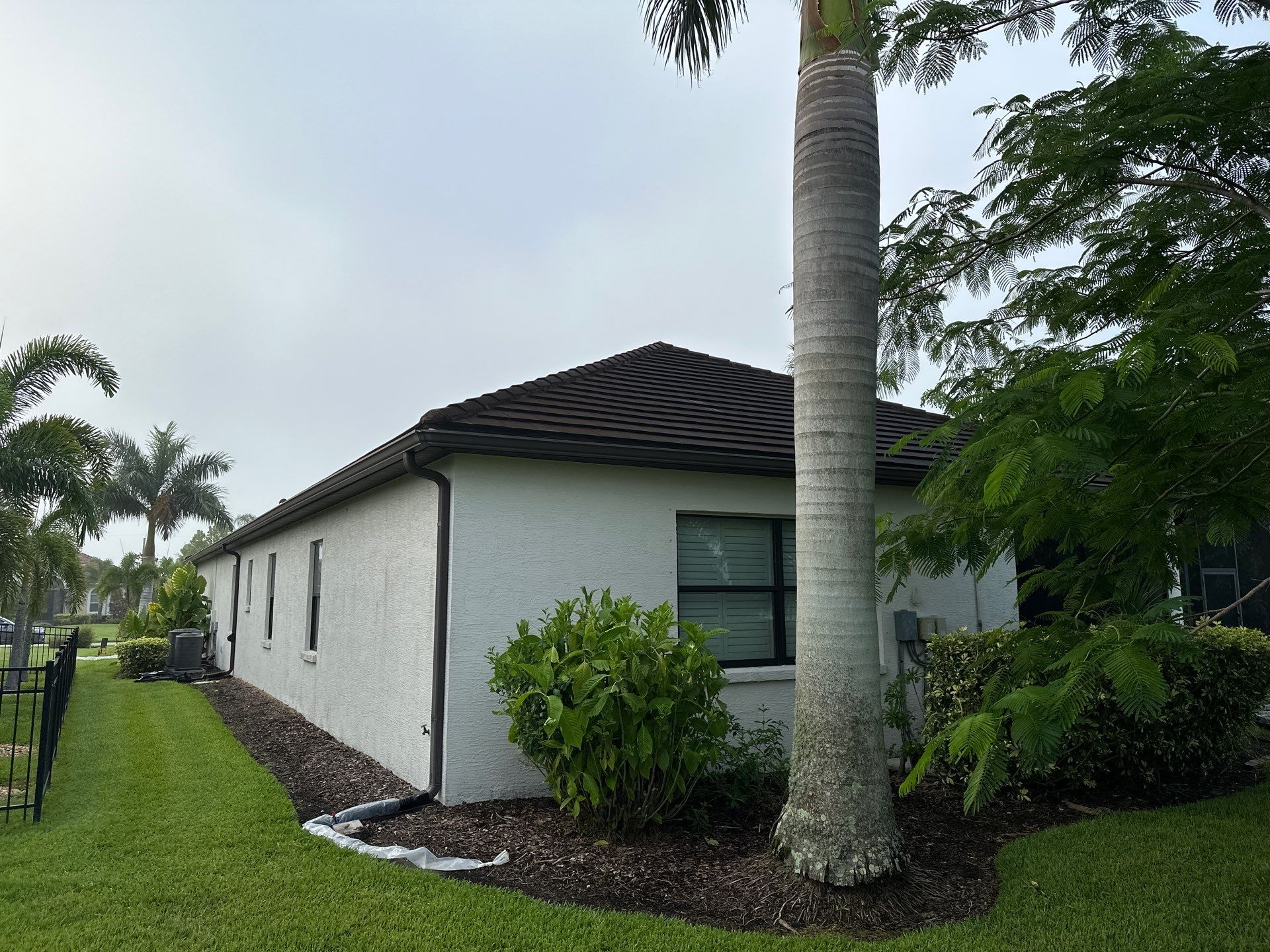 Flat Tile Roof Cleaning, House Wash & Sidewalk Cleaning in Enclave at Country Meadows, Bradenton, FL | Sunshine AquaWash by Sunshine AquaWash