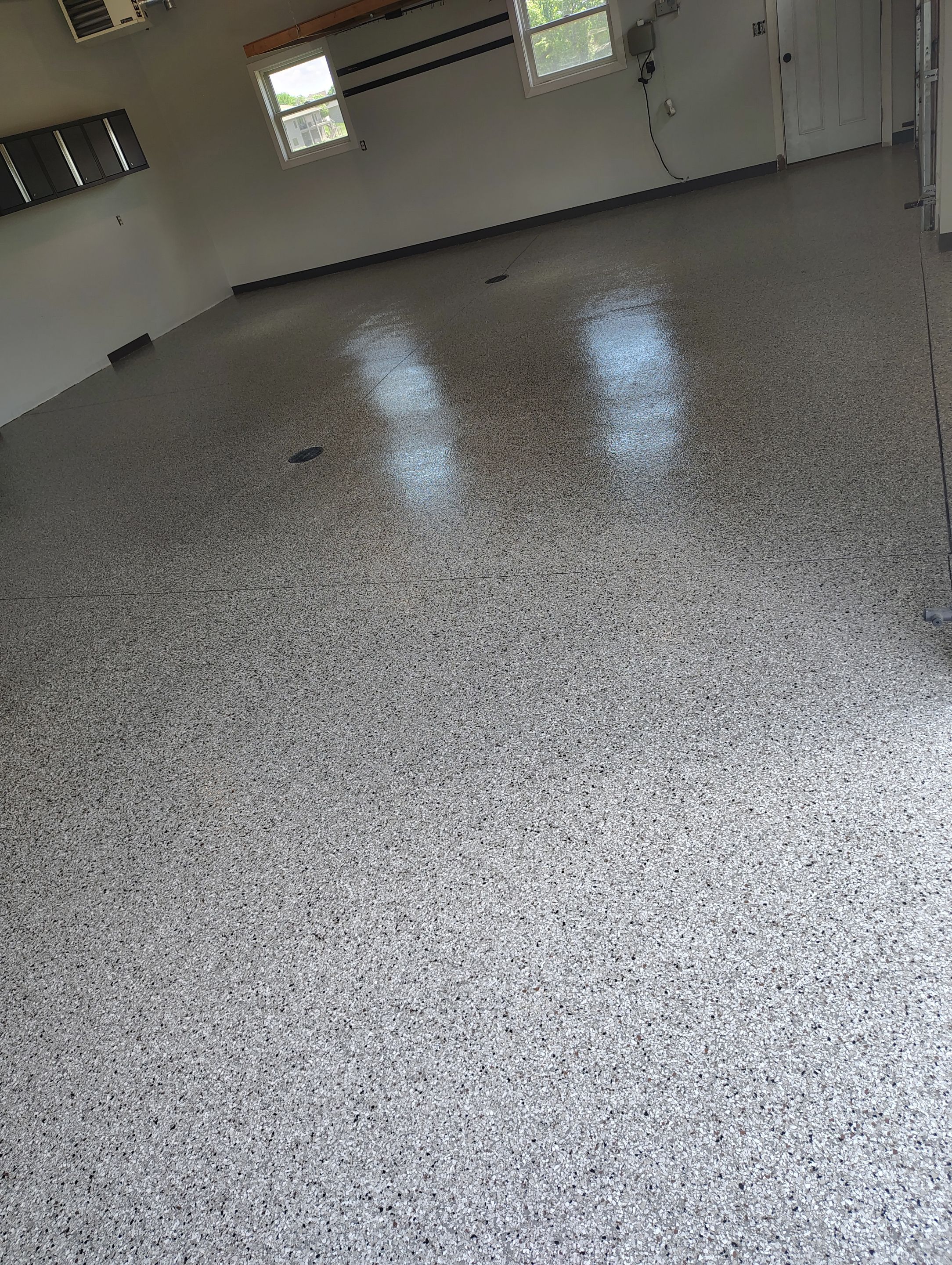 Multi-Car Garage Concrete Coating and Crack Repair in Dell Rapids by Select Painting, Coatings & Garage Cabinets