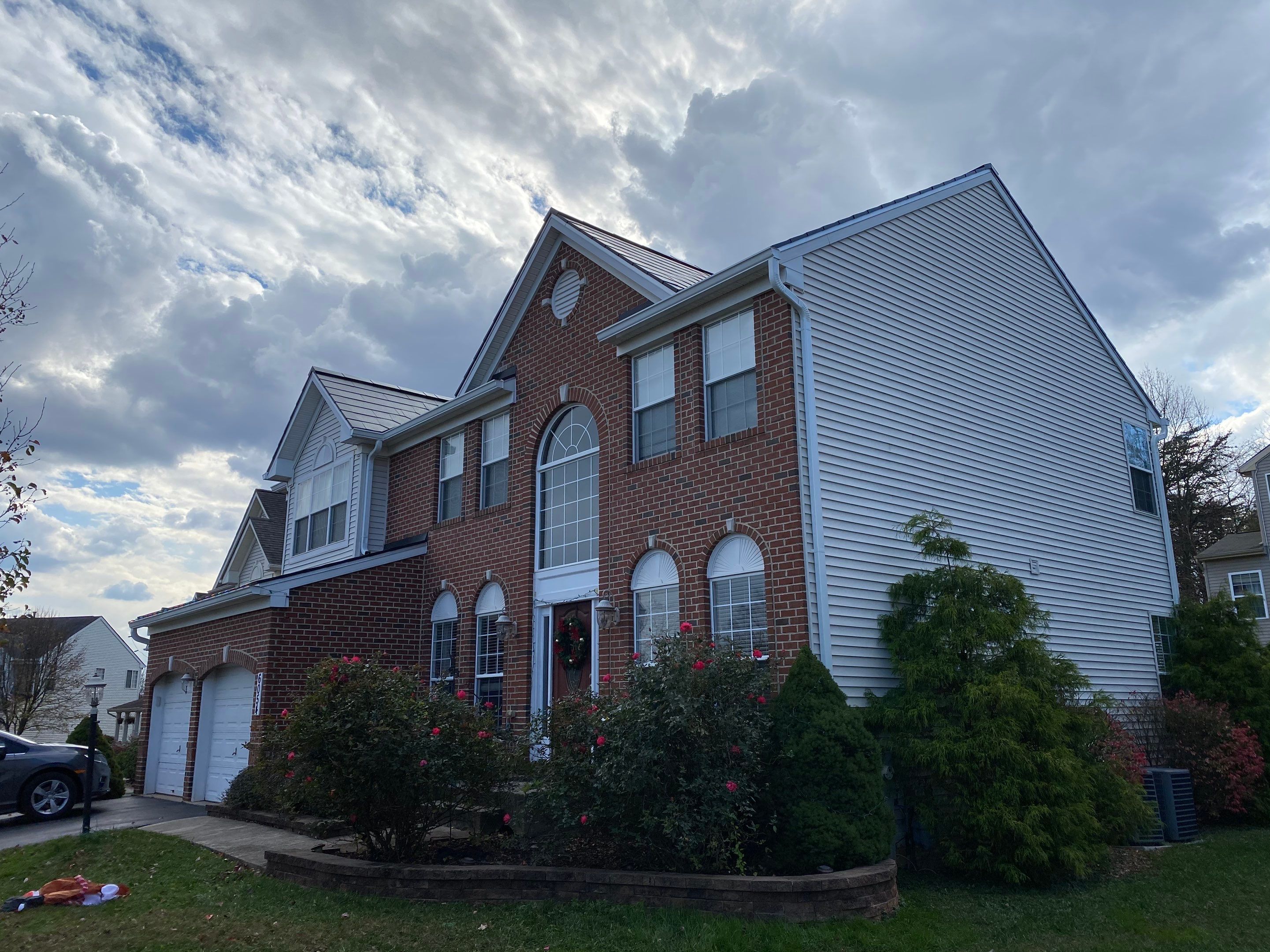 Tesla Solar Roof Installation by American Home Contractors