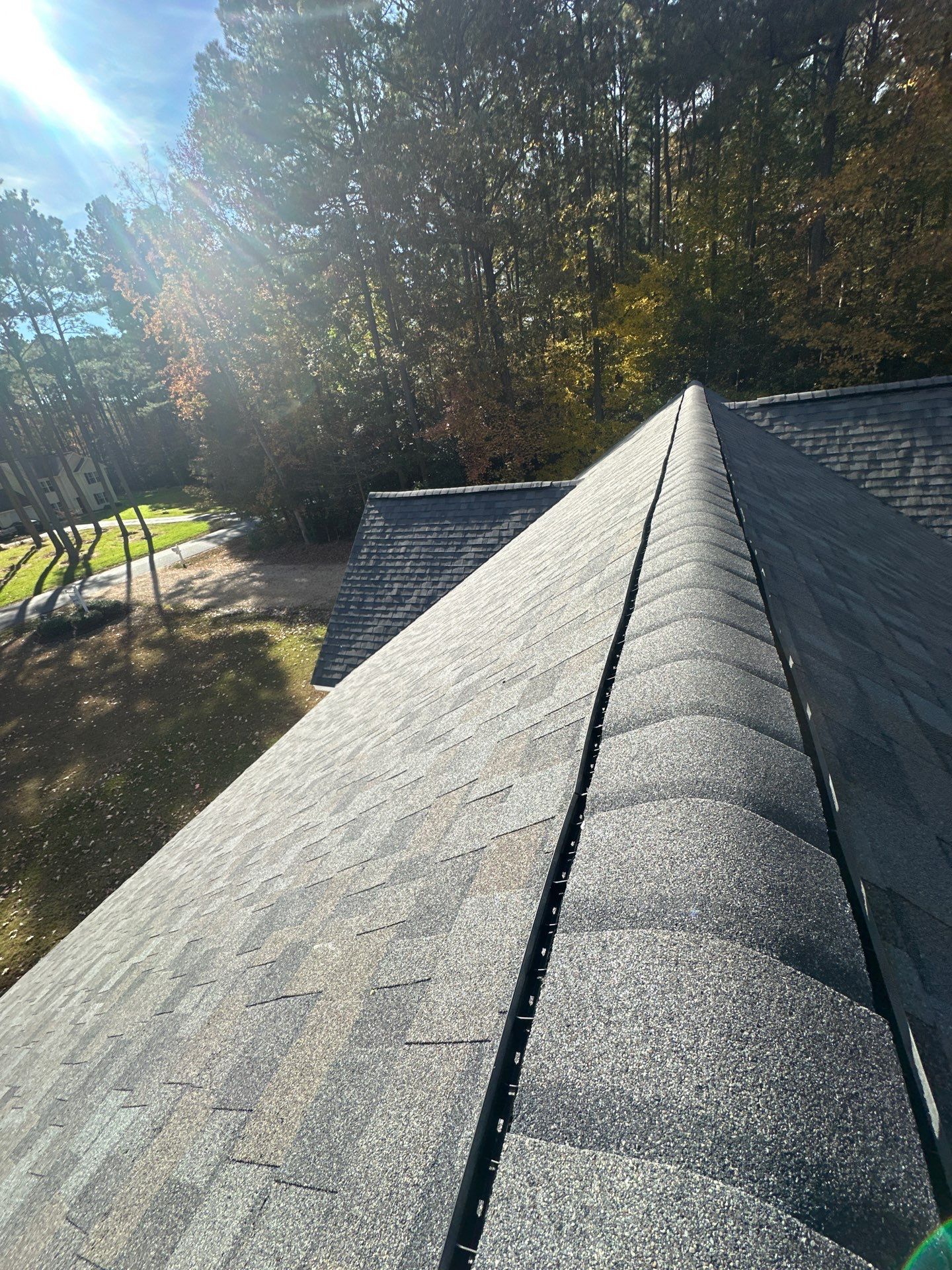 Mathews Residential Roof Replacement Using Owens Corning Duration Shingles by Cade Construction