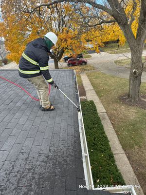 Gutter cleaning and downspout unclog