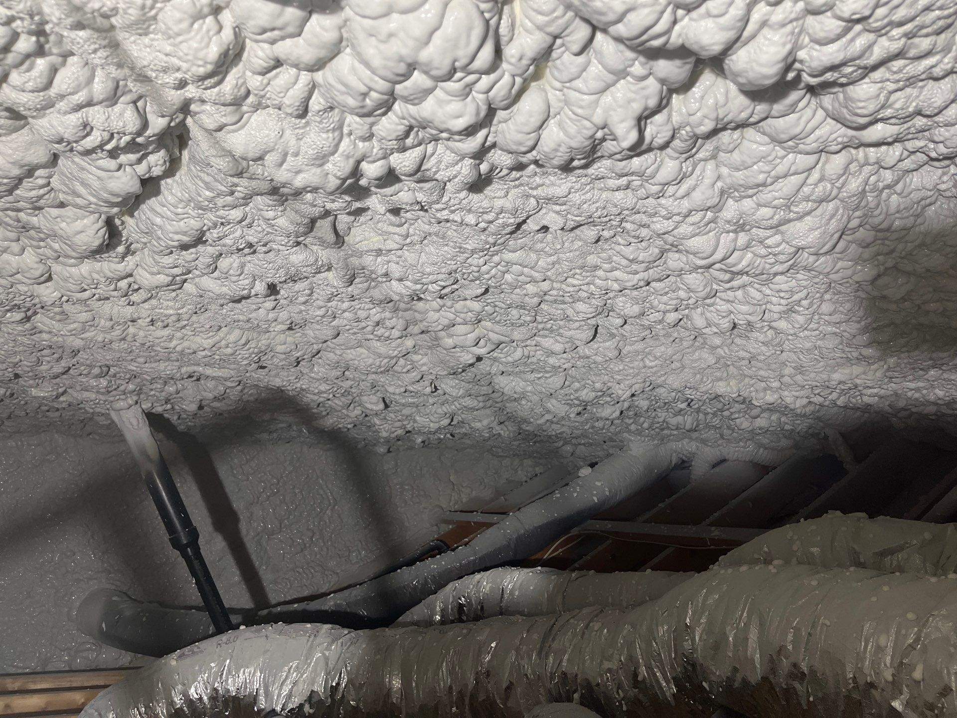 Attic Insulation using open cell spray foam by NYS Foam & Energy
