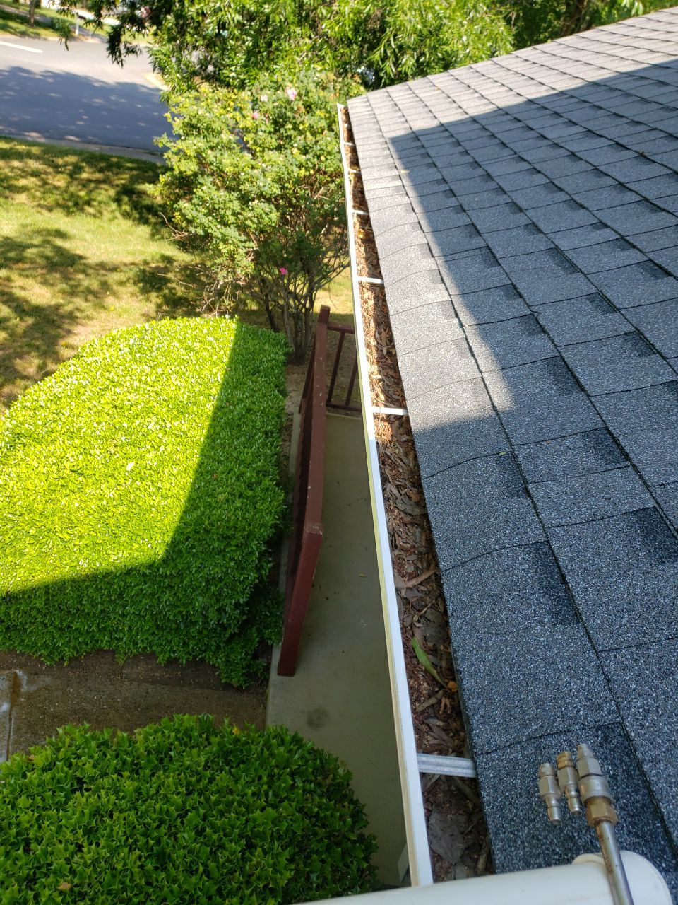 Gutter Cleaning using water by G&H Home Tech Pros LLC