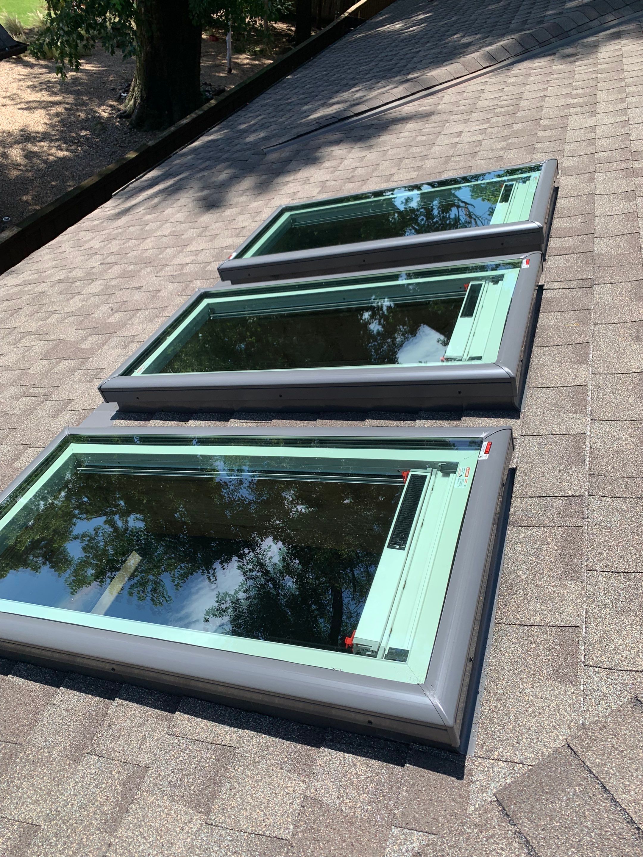 roof repair and skylight replacements in Norman by McCann's Roofing and Construction