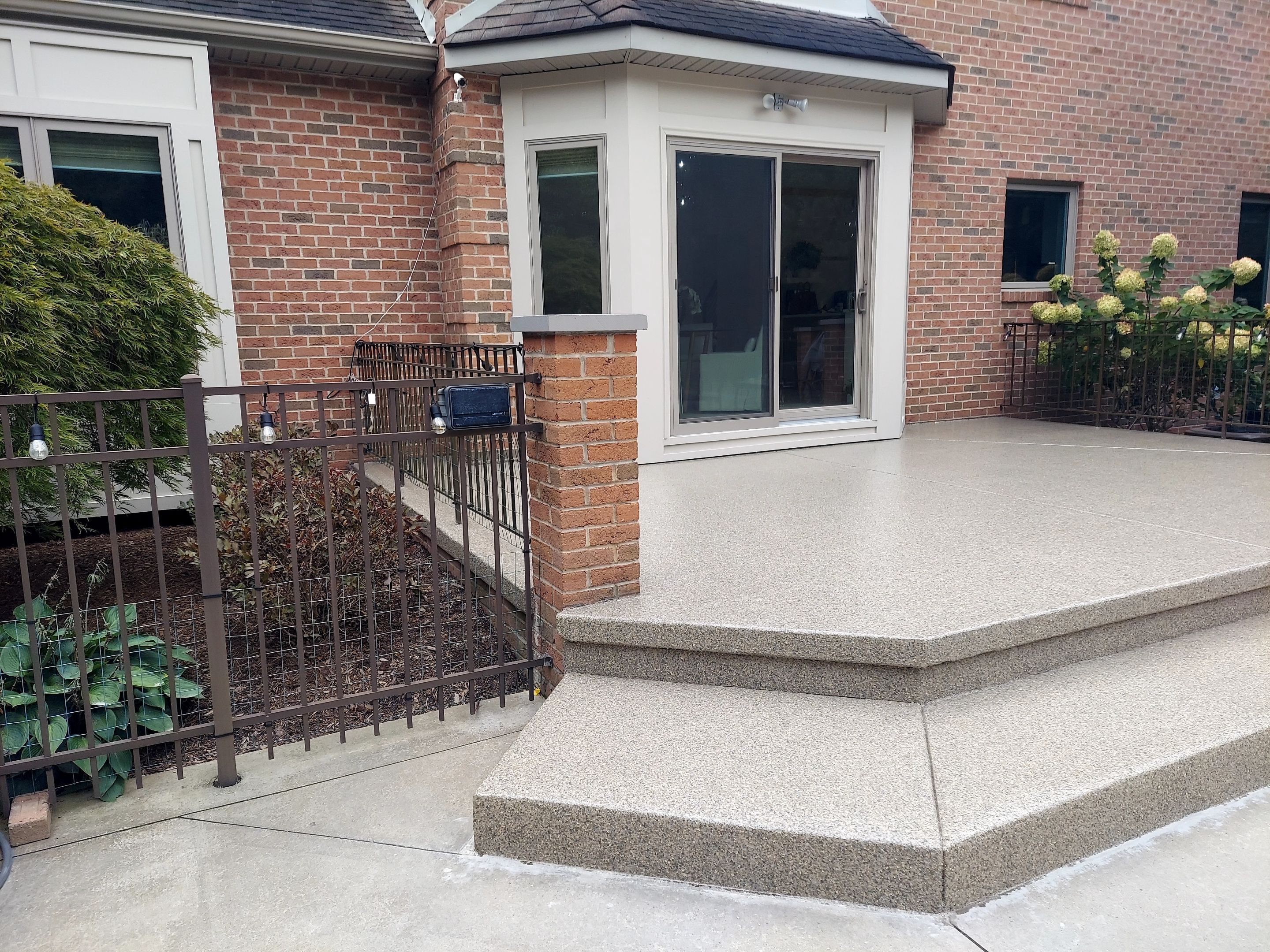 Patio in Trail Mix - Hermitage, PA by Alexander Concrete Coatings