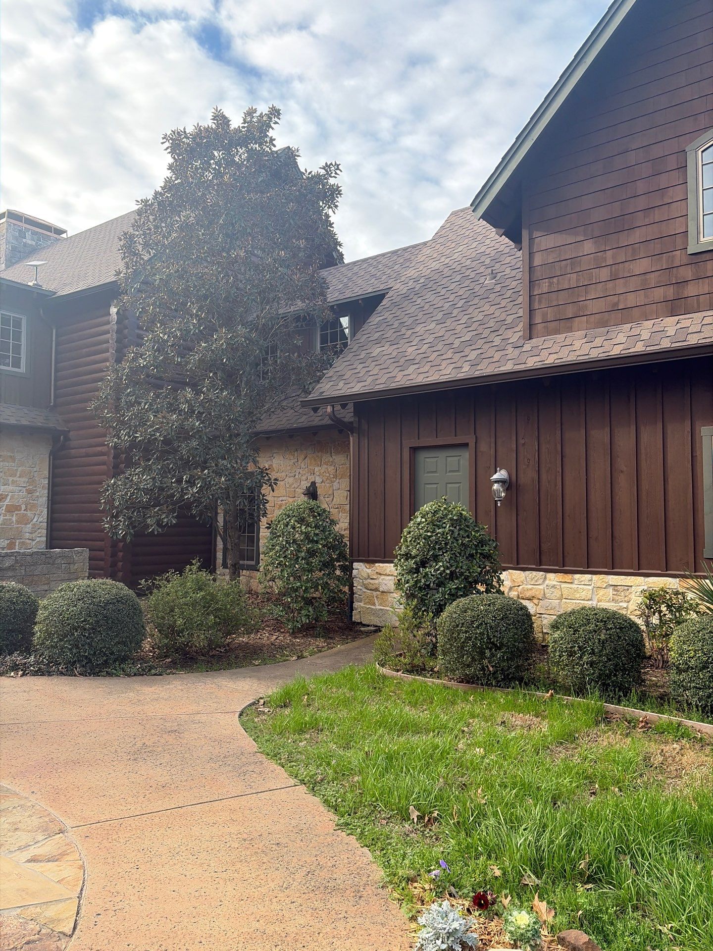 A Complete Exterior Refresh for a Custom Log Home & Property in Alba, Texas by Quality Coats Painting