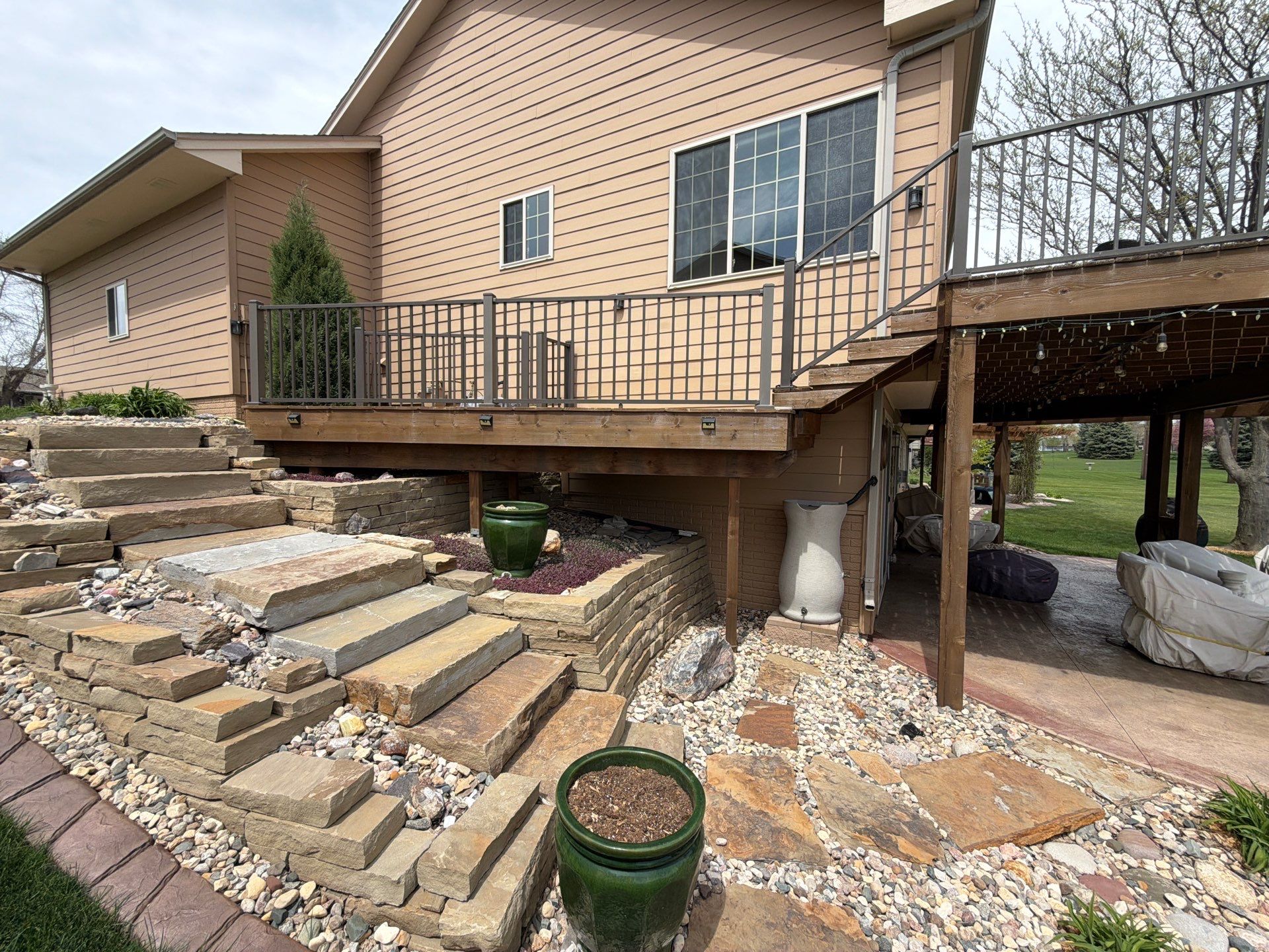Tiered Wood Deck and Pergola Refinishing in Sioux Falls by Select Painting, Coatings & Garage Cabinets