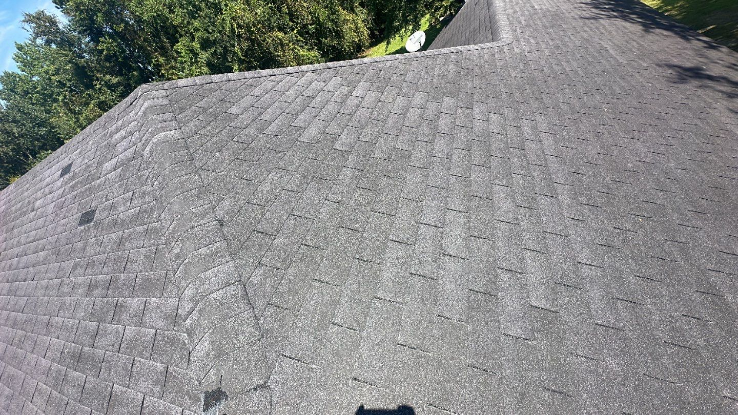 Residential Roofing Installation using Benton 26Ga 1inc Snapcock Metal Roof KYNAR Matte Black by Talya Roofing